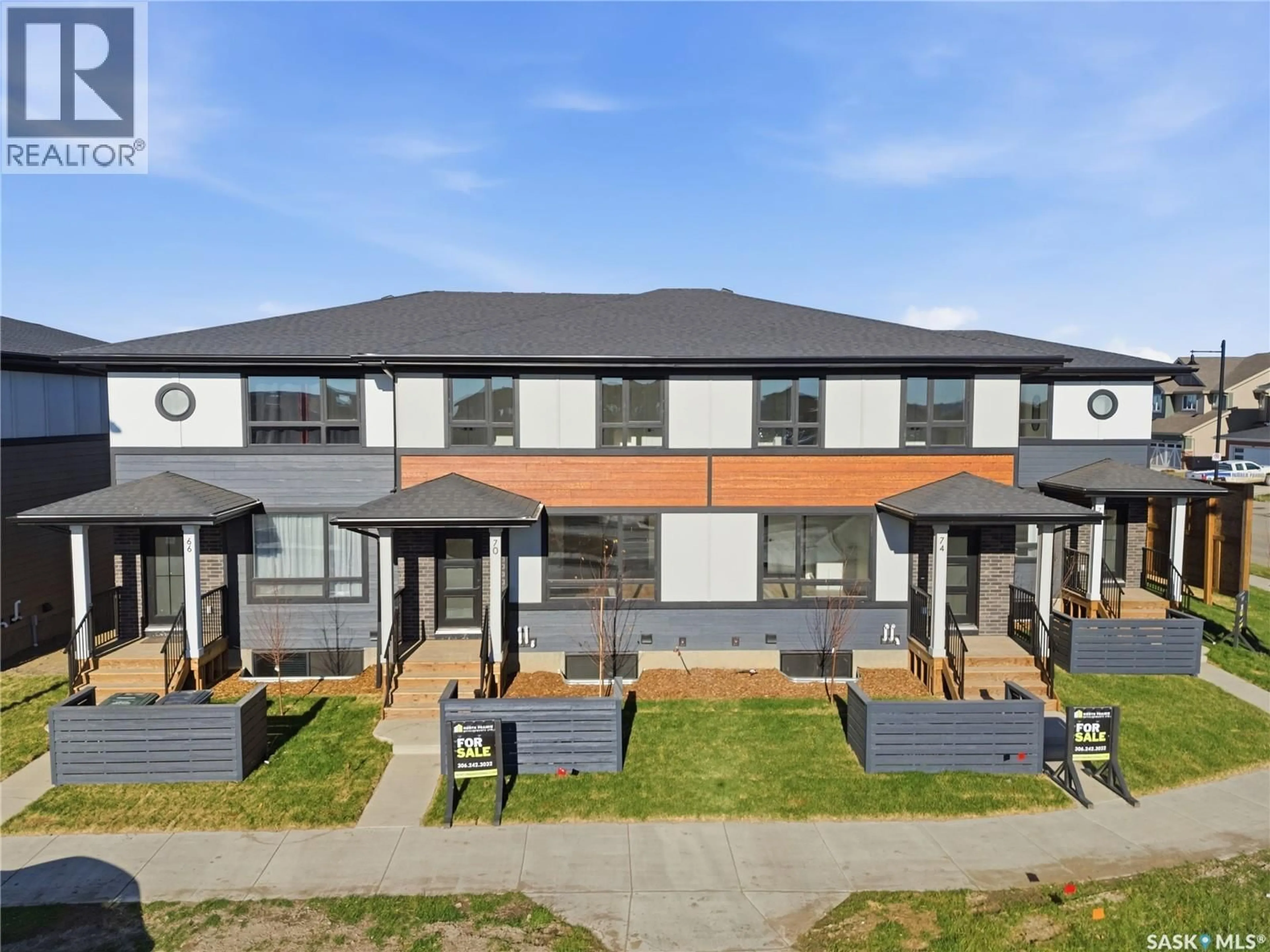 A pic from outside/outdoor area/front of a property/back of a property/a pic from drone, street for 46 TASKAMANWA TERRACE, Saskatoon Saskatchewan S7V1Z7