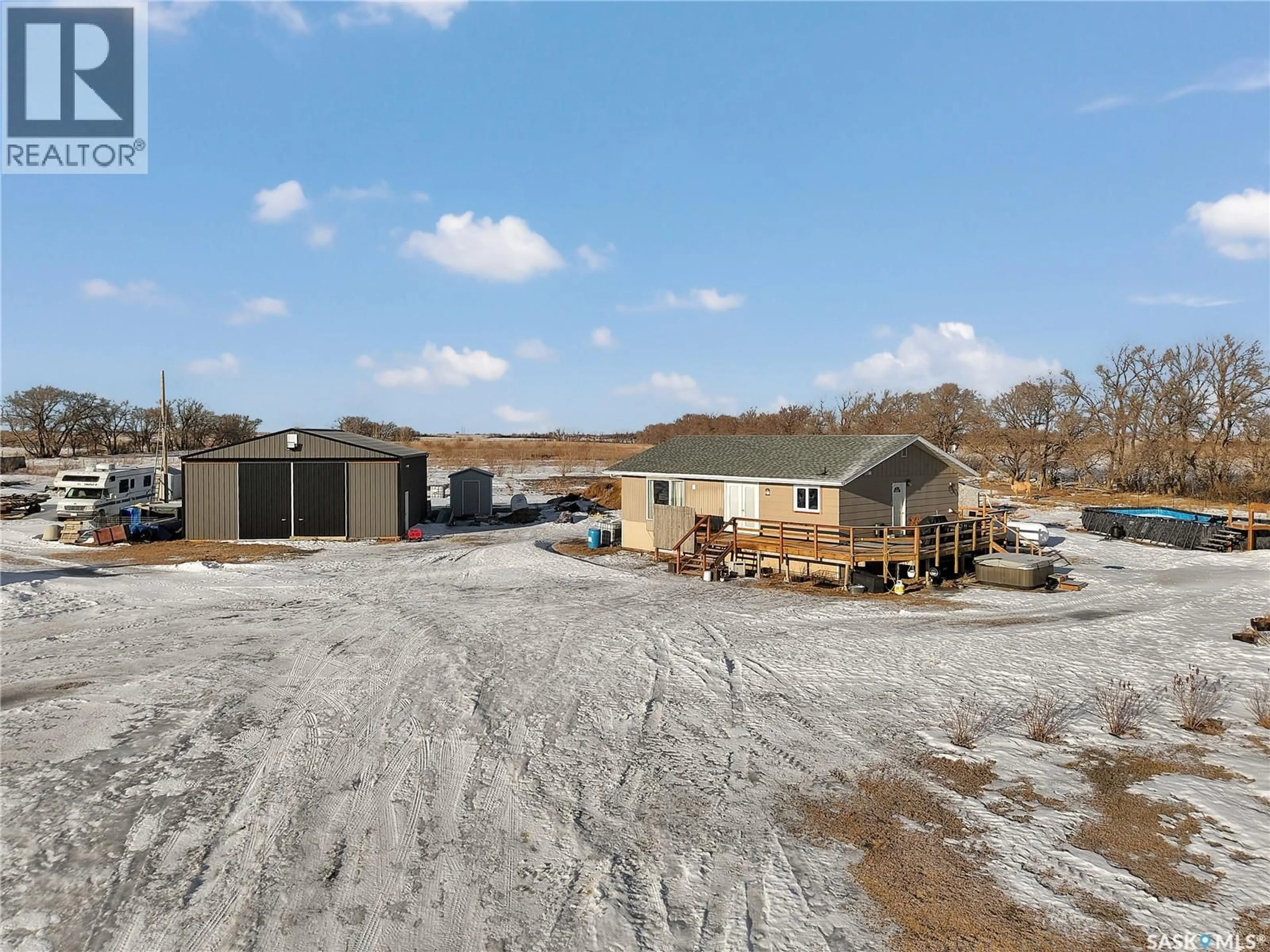 A pic from outside/outdoor area/front of a property/back of a property/a pic from drone, building for WILLOW LANE ACREAGE, Dundurn Rm No. 314 Saskatchewan S0K1S0