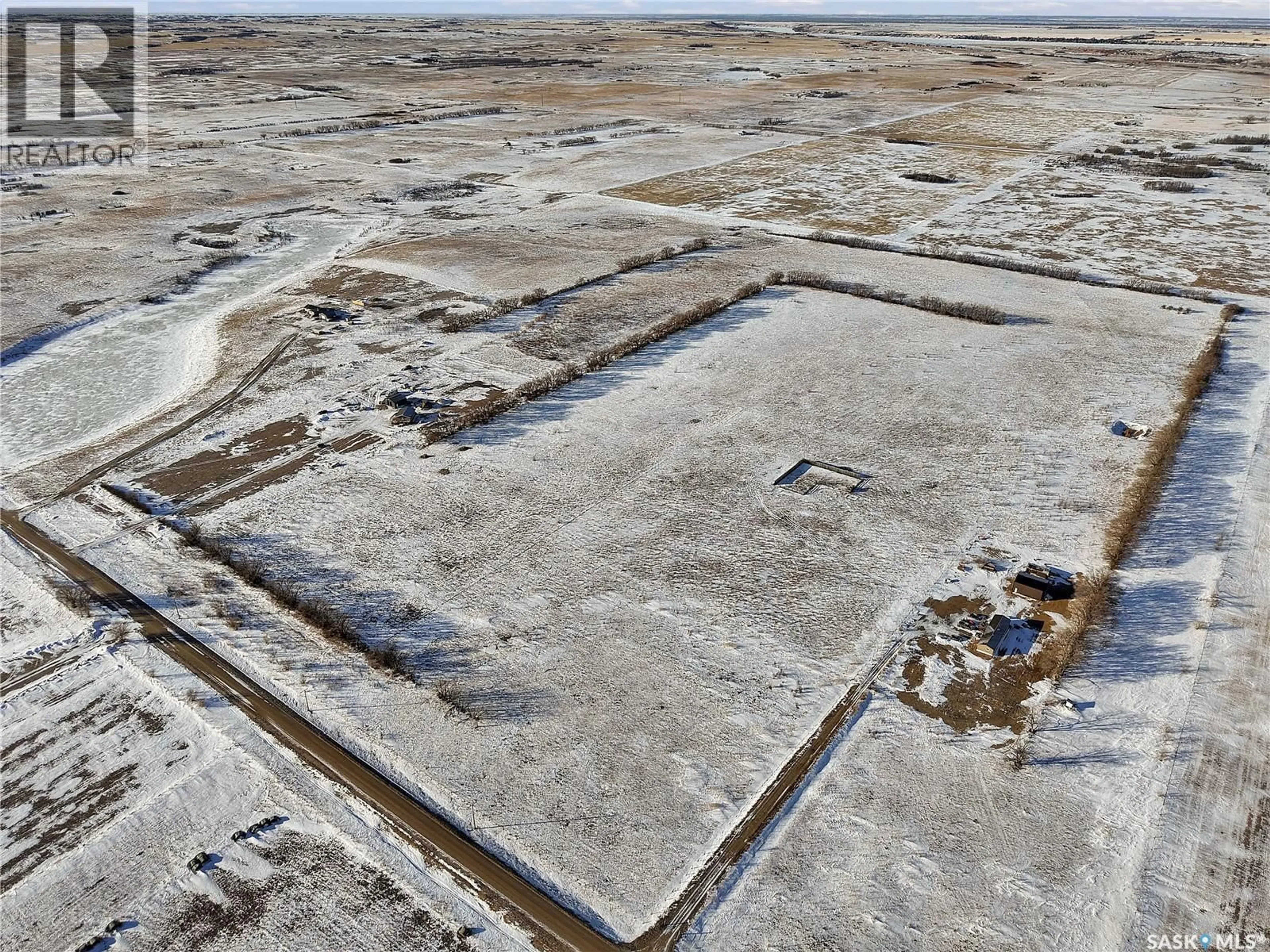 A pic from outside/outdoor area/front of a property/back of a property/a pic from drone, building for WILLOW LANE ACREAGE, Dundurn Rm No. 314 Saskatchewan S0K1S0