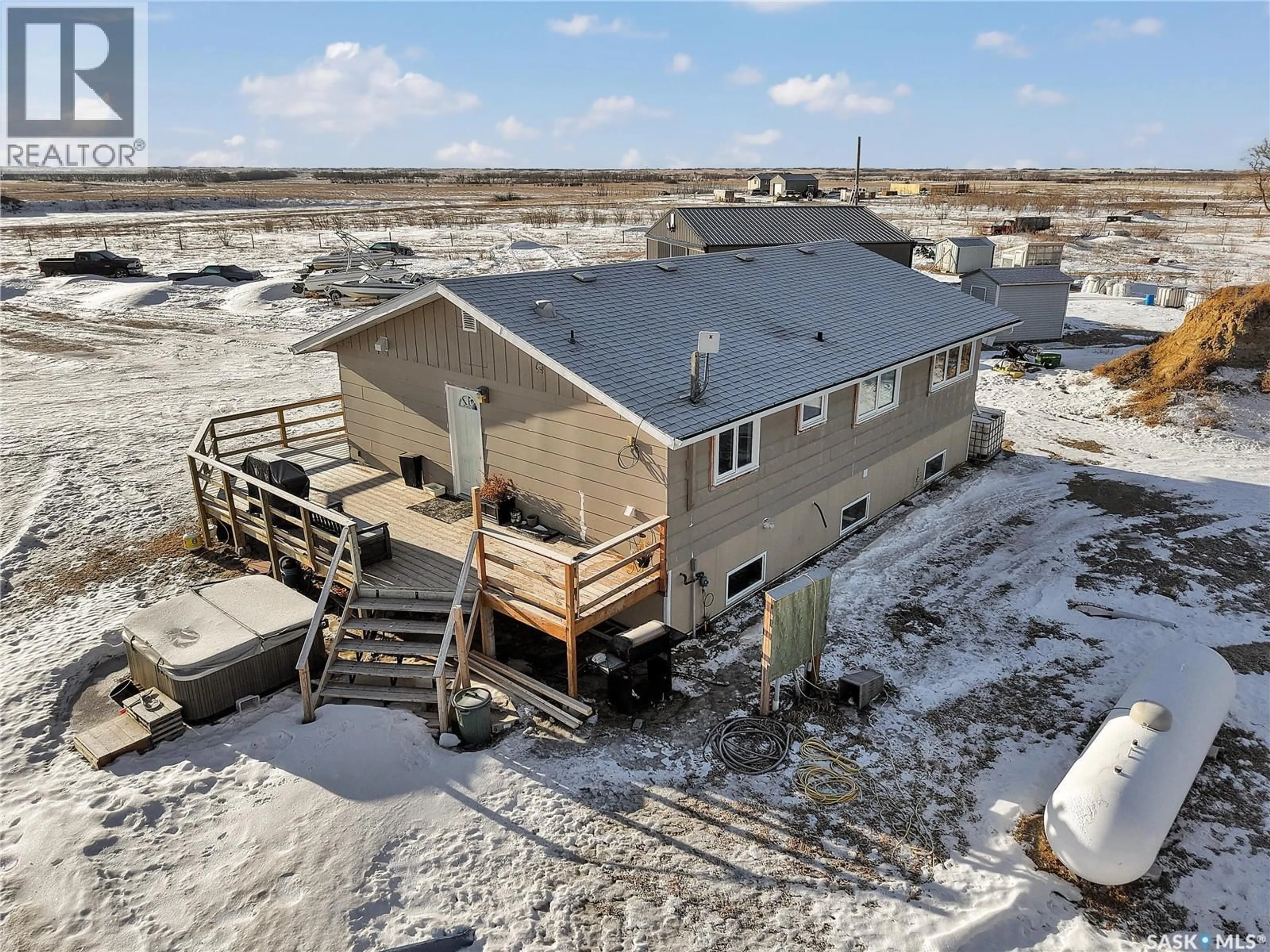 A pic from outside/outdoor area/front of a property/back of a property/a pic from drone, water/lake/river/ocean view for WILLOW LANE ACREAGE, Dundurn Rm No. 314 Saskatchewan S0K1S0