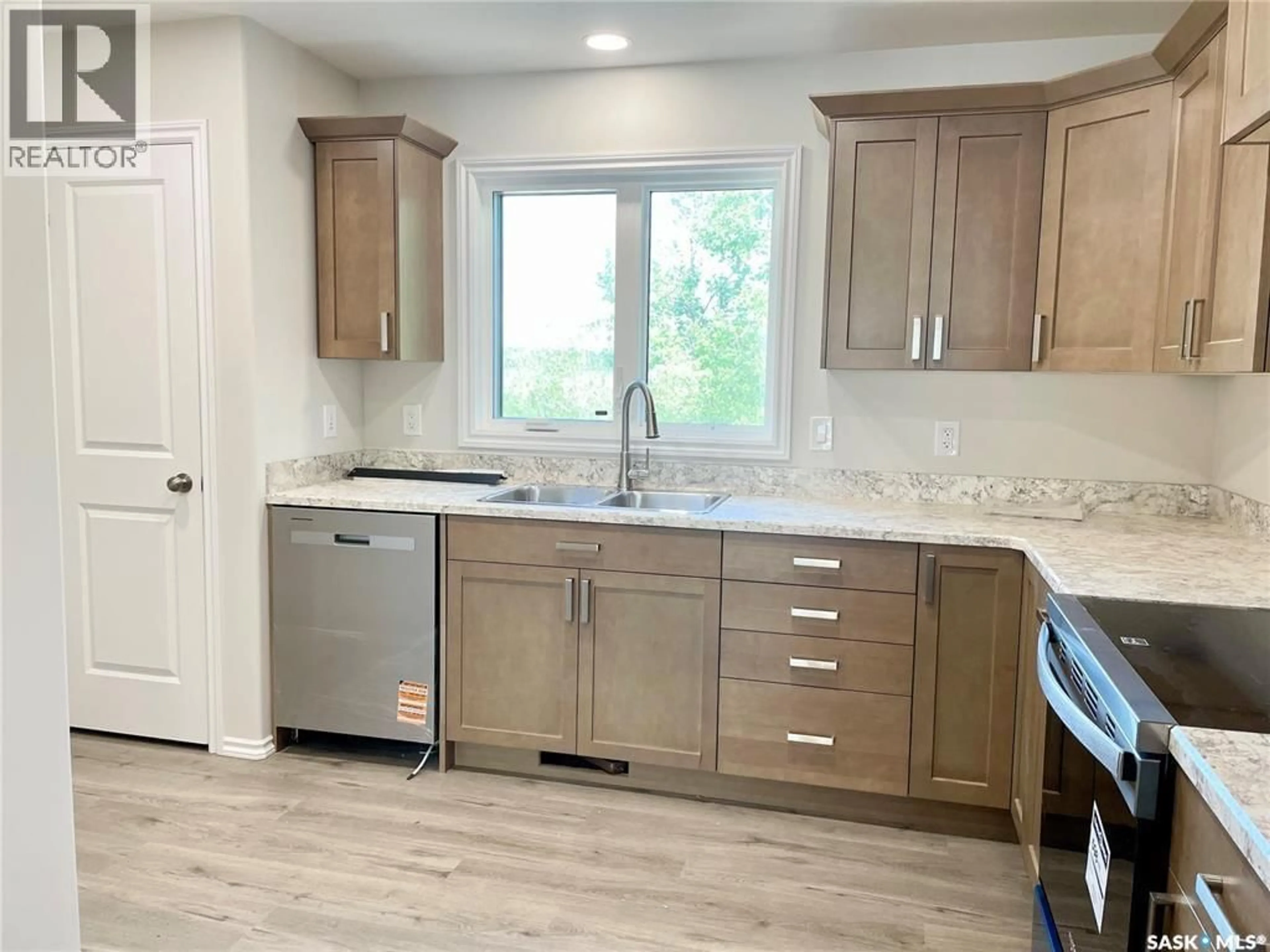 Open concept kitchen, unknown for 1121 DEERFOOT TRAIL, Good Spirit Lake Saskatchewan S0A0L0