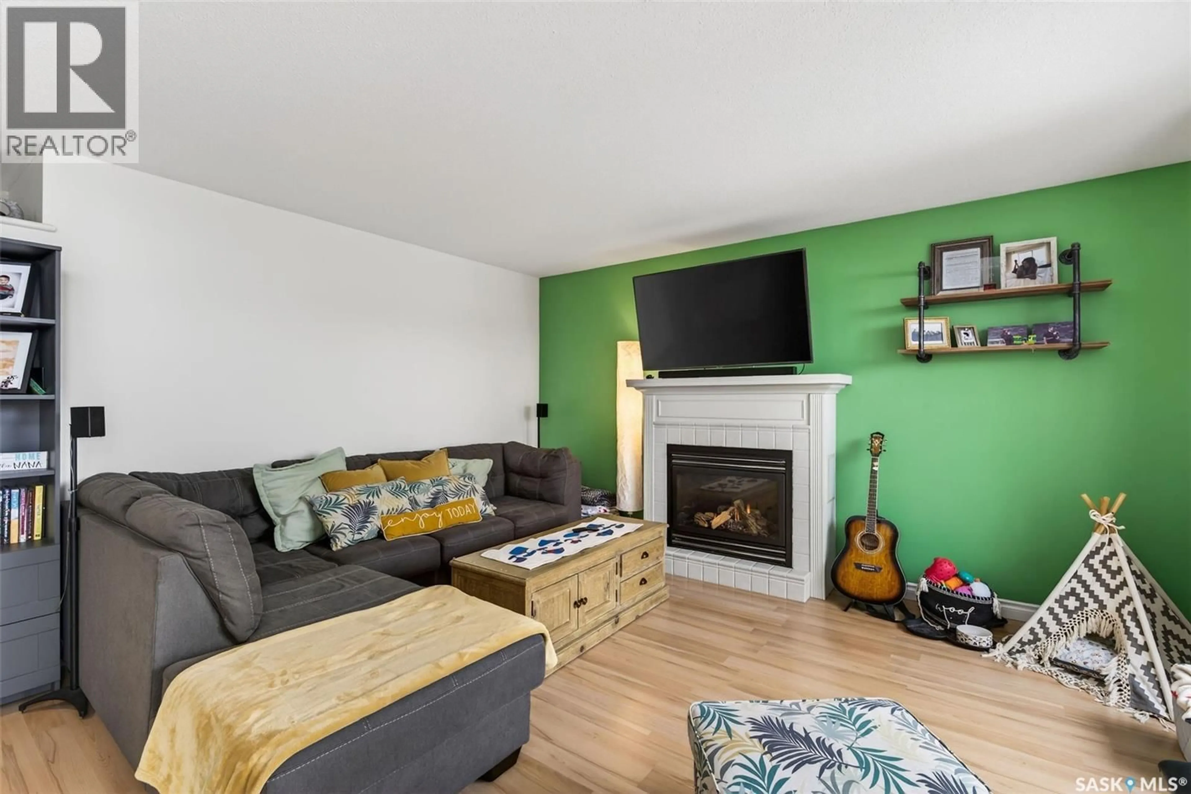 Living room with furniture, wood/laminate floor for 1720 OLIVE DIEFENBAKER DRIVE, Prince Albert Saskatchewan S6X1B6