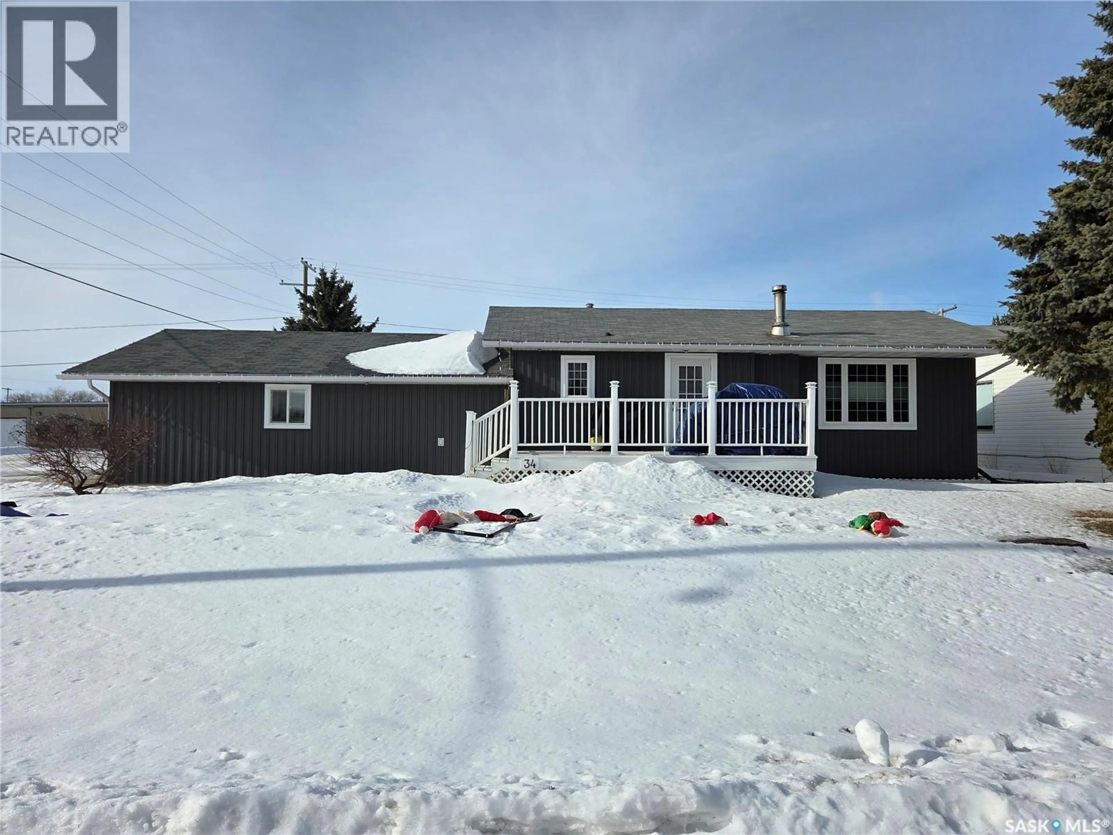 Home with vinyl exterior material, street for 34 LUMSDEN STREET, Manor Saskatchewan S0C1R0