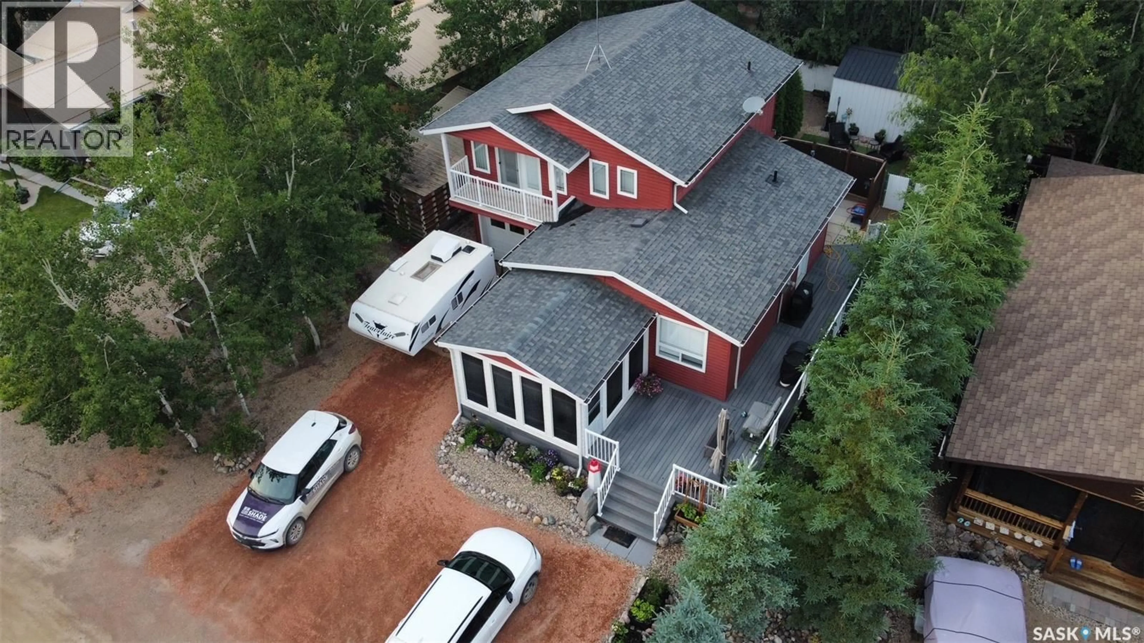 A pic from outside/outdoor area/front of a property/back of a property/a pic from drone, street for 408 OLDROYD DRIVE, Good Spirit Lake Saskatchewan S0A0L0