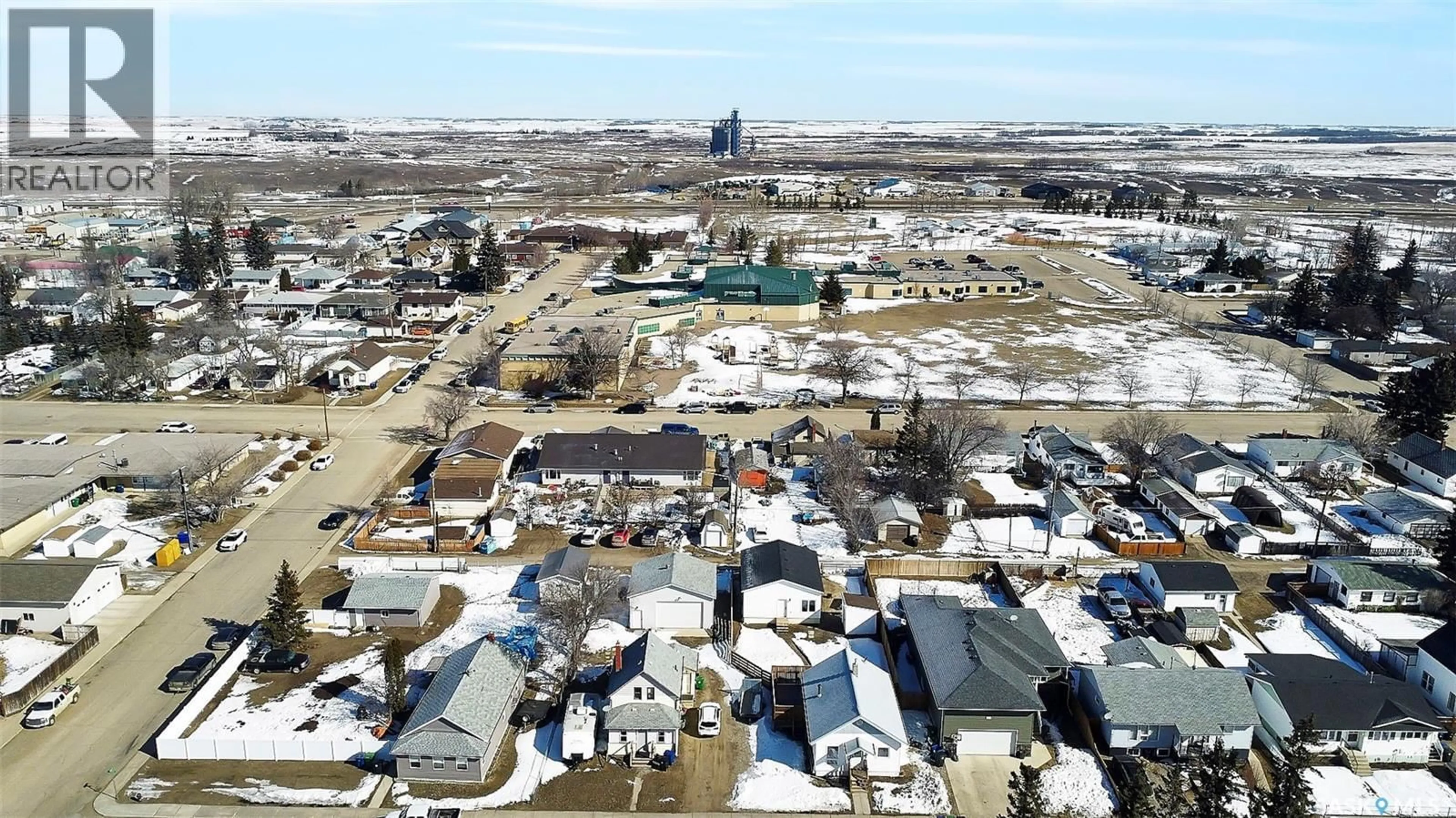 A pic from outside/outdoor area/front of a property/back of a property/a pic from drone, street for 207 5TH AVENUE, Biggar Saskatchewan S0K0M0