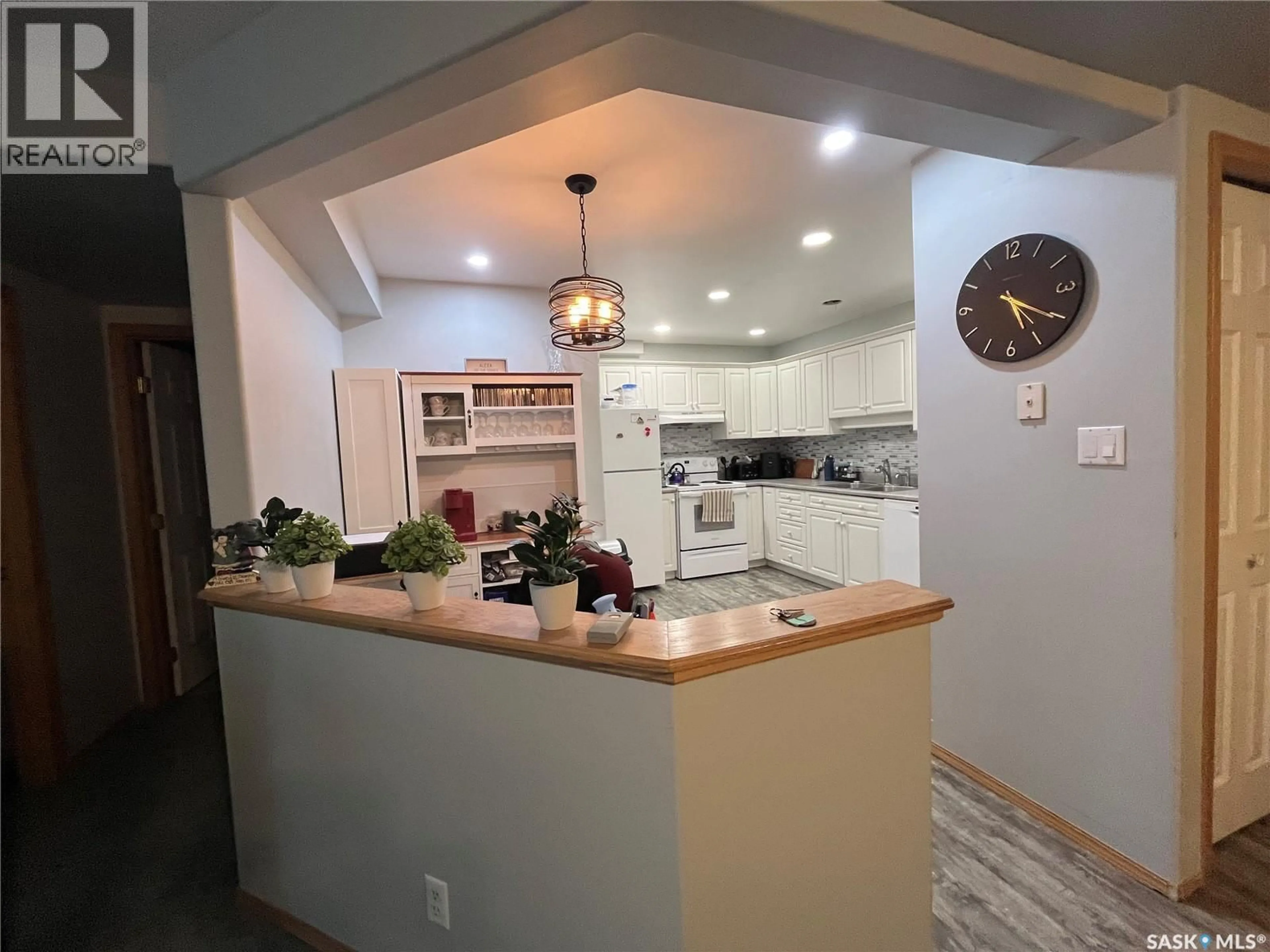 Open concept kitchen, ceramic/tile floor for 106 - 331 MACOUN DRIVE, Swift Current Saskatchewan S9H0A1