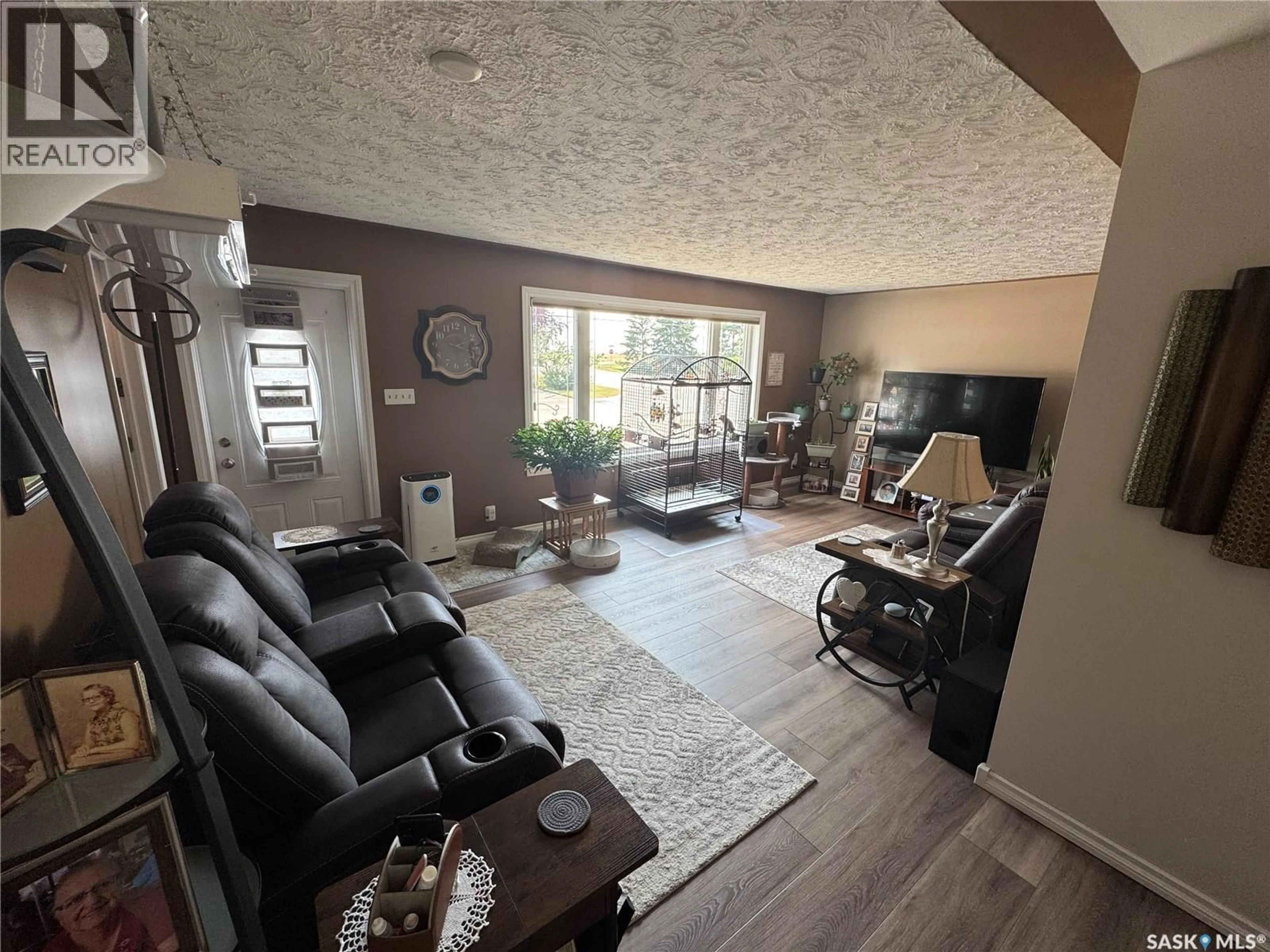 Living room with furniture, unknown for 218 PIERCE STREET, Strasbourg Saskatchewan S0G4V0