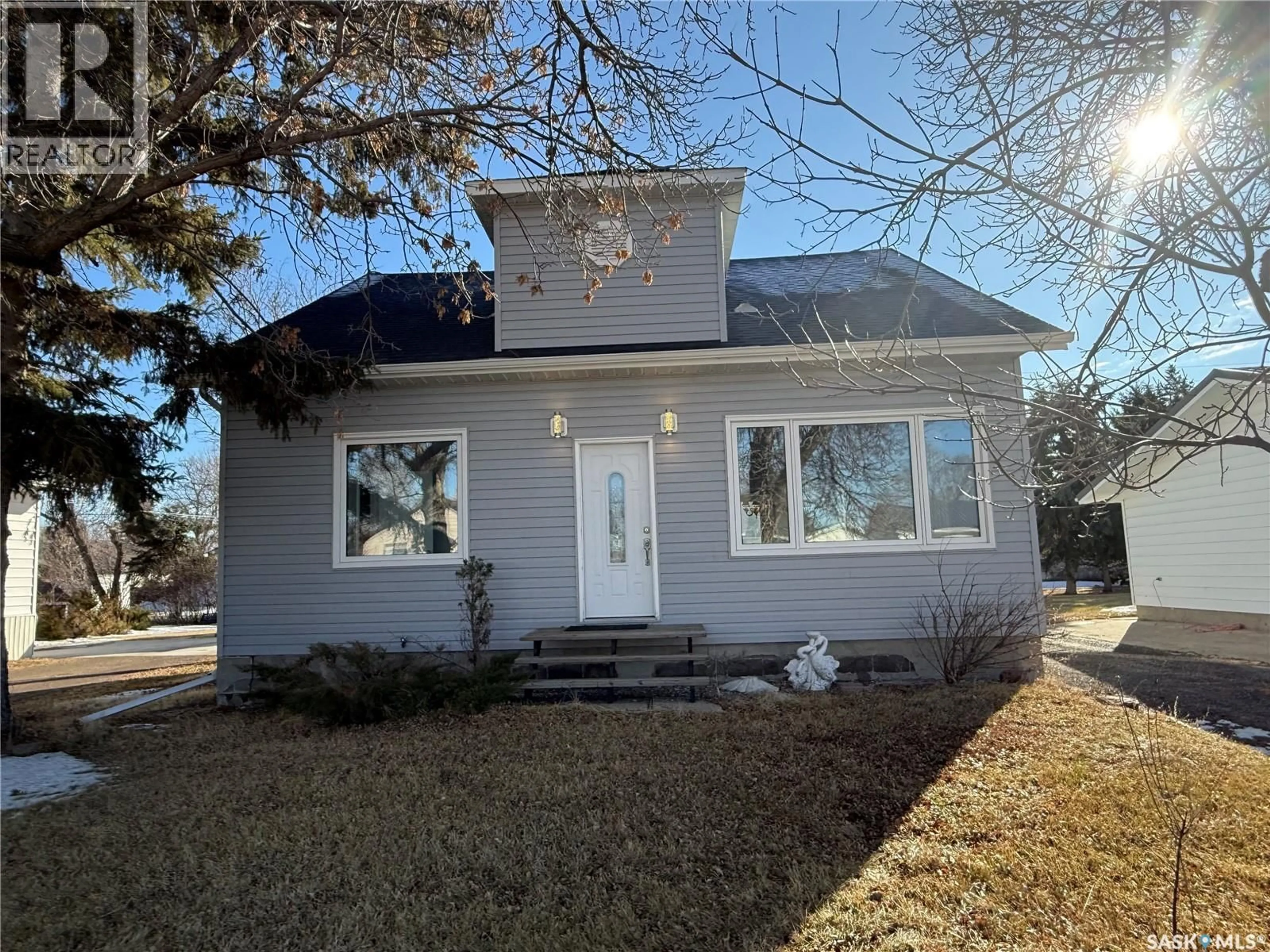 Home with vinyl exterior material, street for 208 PRAIRIE STREET, Yellow Grass Saskatchewan S0G5J0