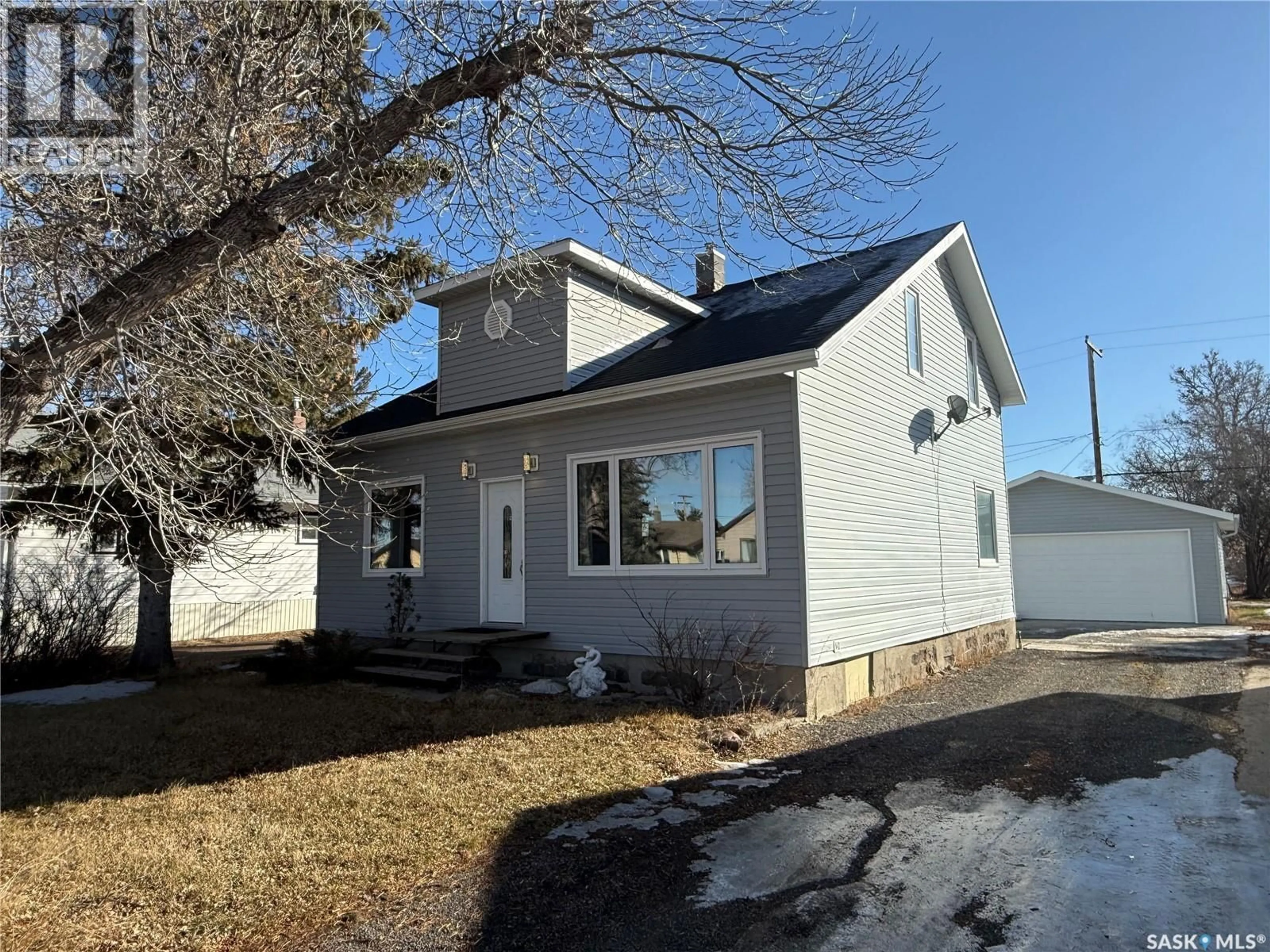 Home with vinyl exterior material, street for 208 PRAIRIE STREET, Yellow Grass Saskatchewan S0G5J0