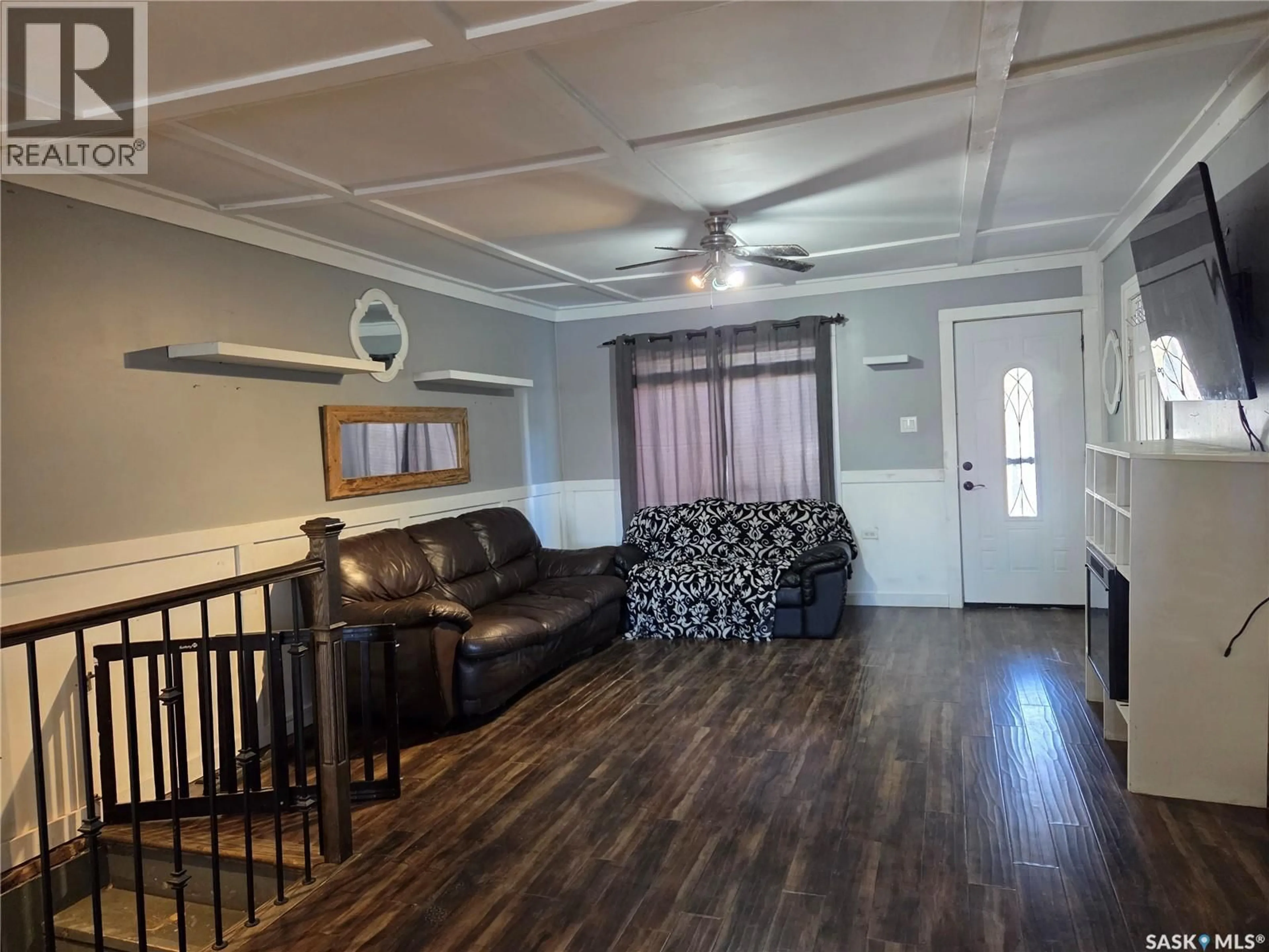 Living room with furniture, wood/laminate floor for 2011 MAIN STREET, Edam Saskatchewan S0M0V0
