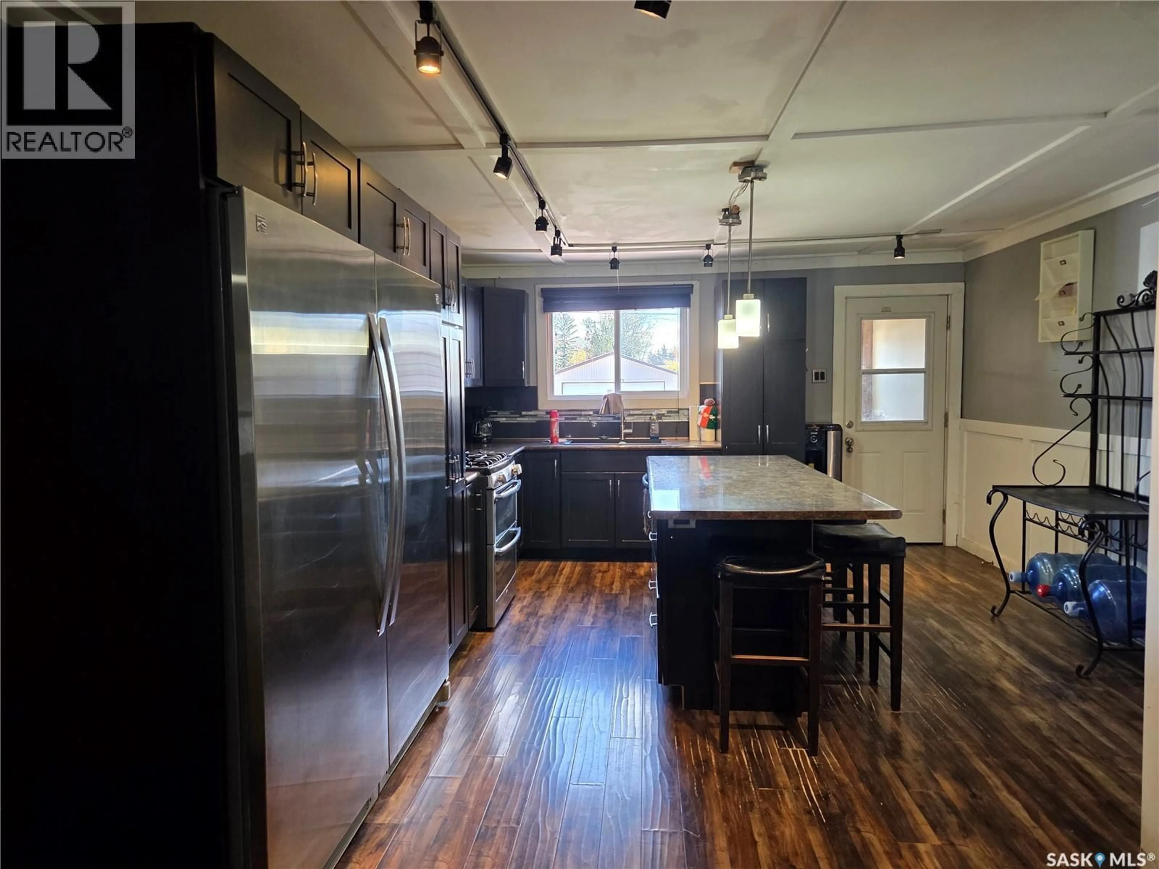 Open concept kitchen, wood/laminate floor for 2011 MAIN STREET, Edam Saskatchewan S0M0V0