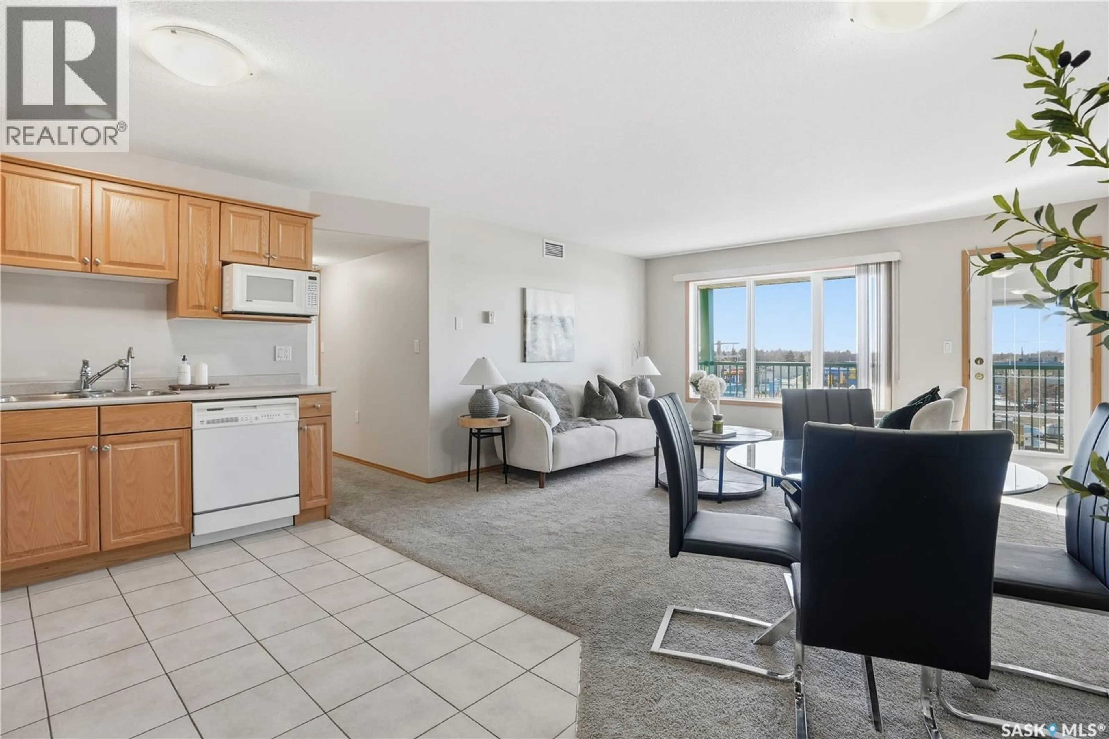 Living room with furniture, unknown for 405 - 205 MCINTYRE STREET, Regina Saskatchewan S4R3B7