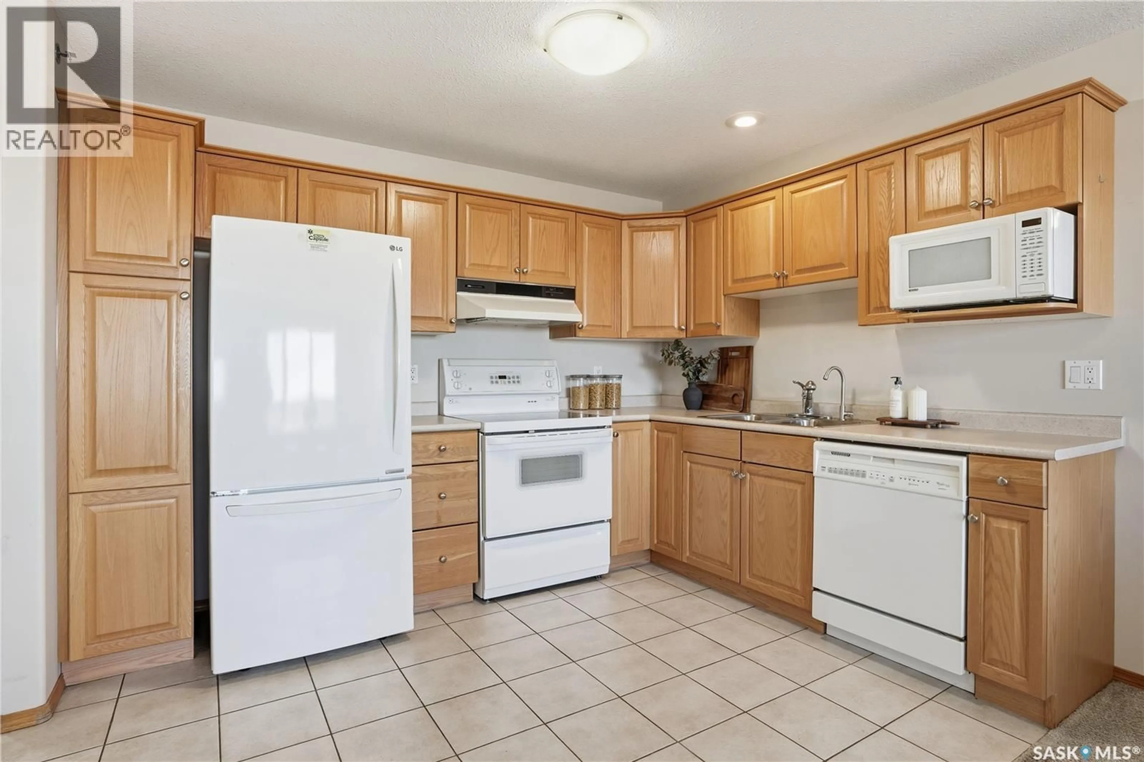 Standard kitchen, ceramic/tile floor for 405 - 205 MCINTYRE STREET, Regina Saskatchewan S4R3B7