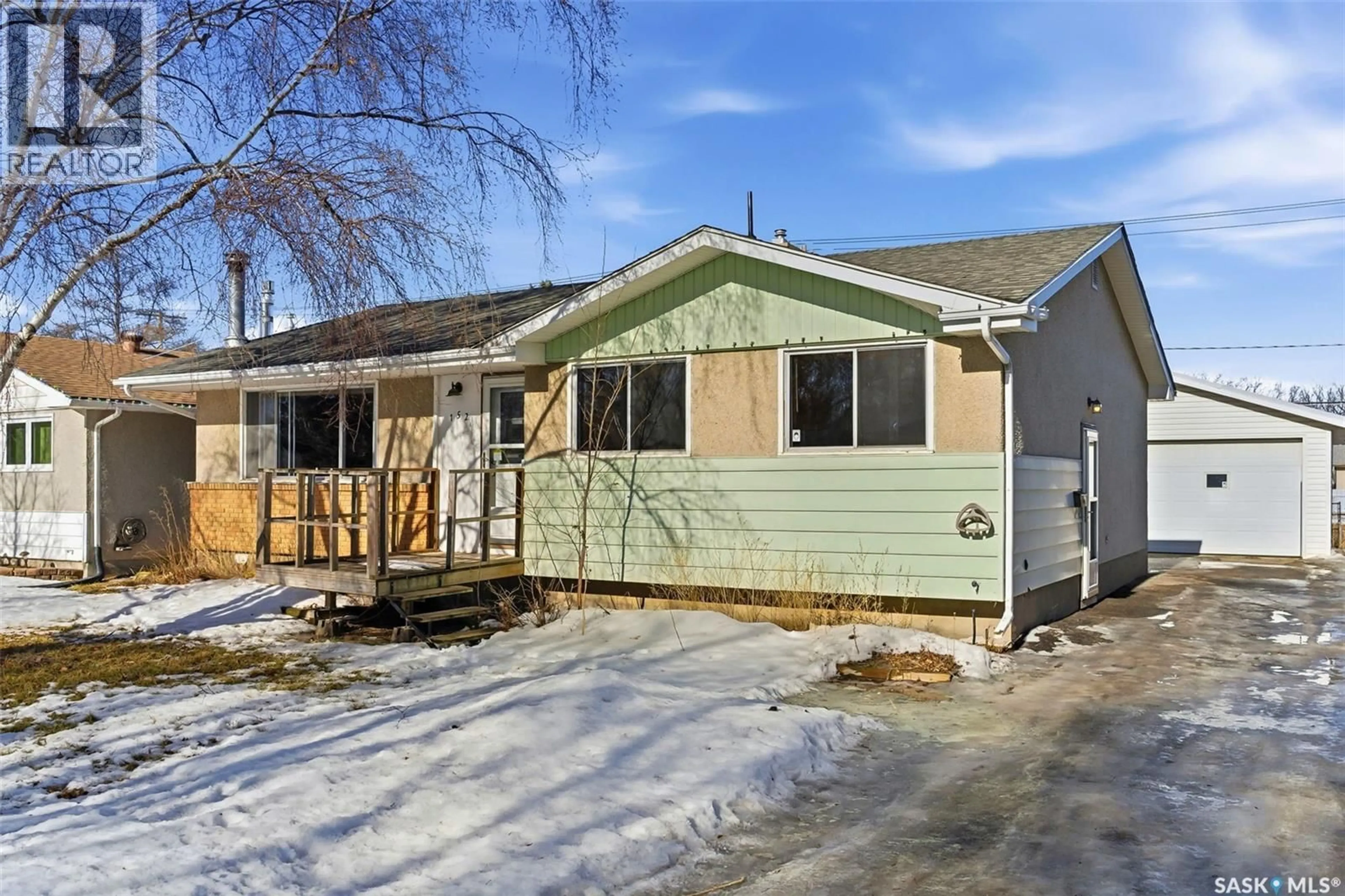Home with vinyl exterior material, street for 152 WOODWARD AVENUE, Regina Saskatchewan S4R3H4