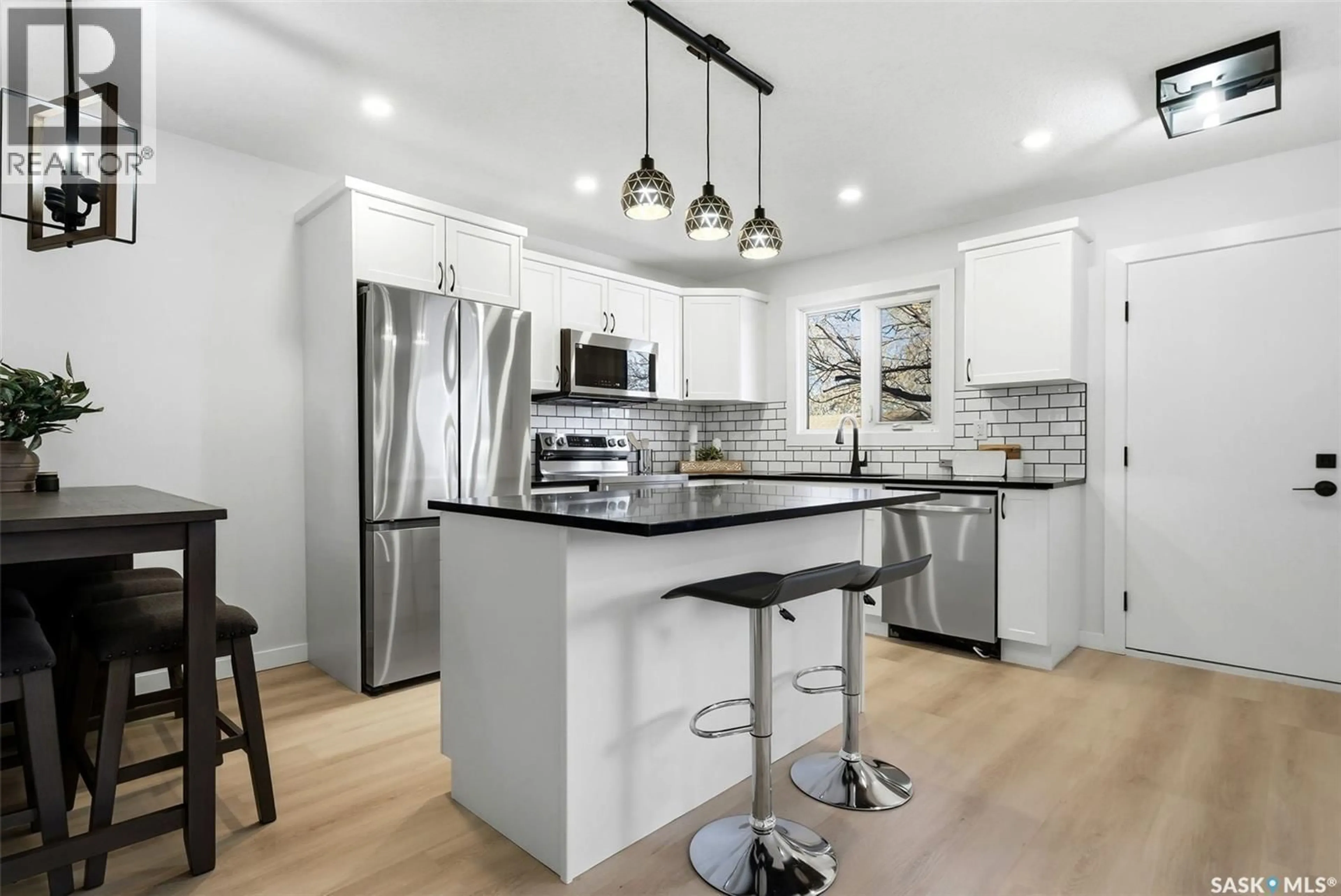 Open concept kitchen, unknown for 915 ROWELL CRESCENT, Regina Saskatchewan S4X2A5