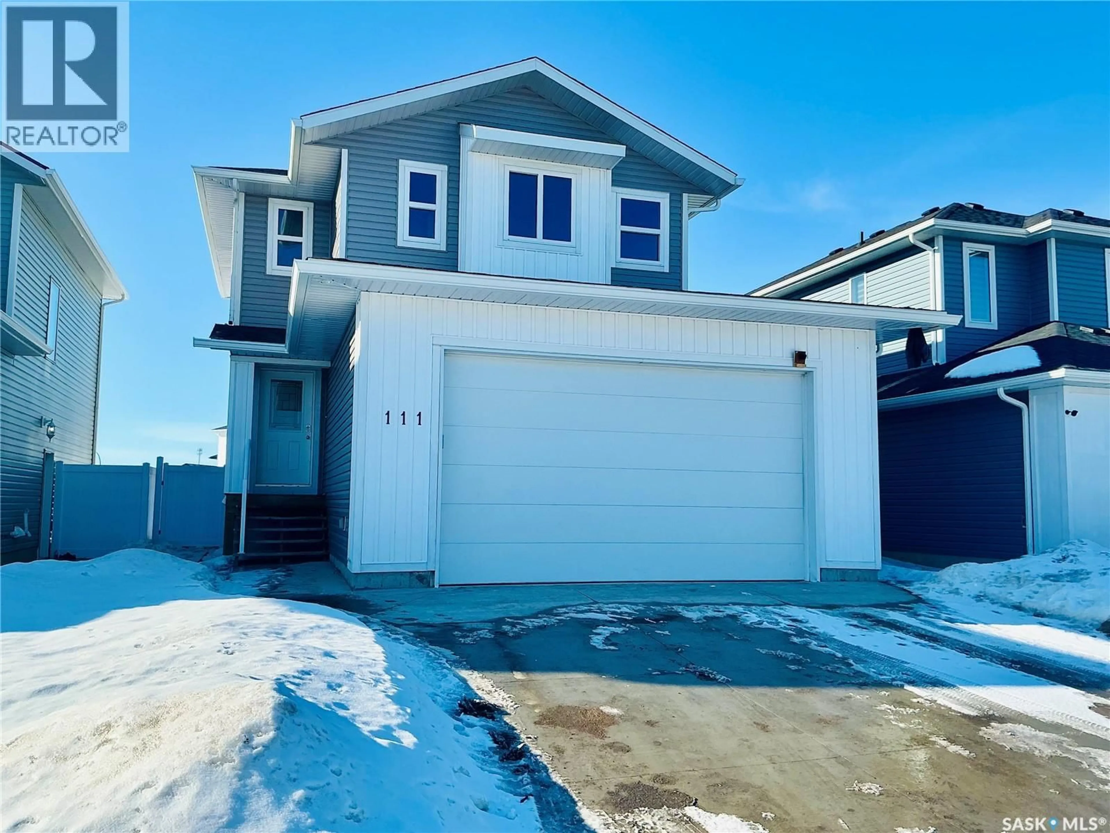 Home with vinyl exterior material, street for 111 STROMBERG CRESCENT, Saskatoon Saskatchewan S7L7C4