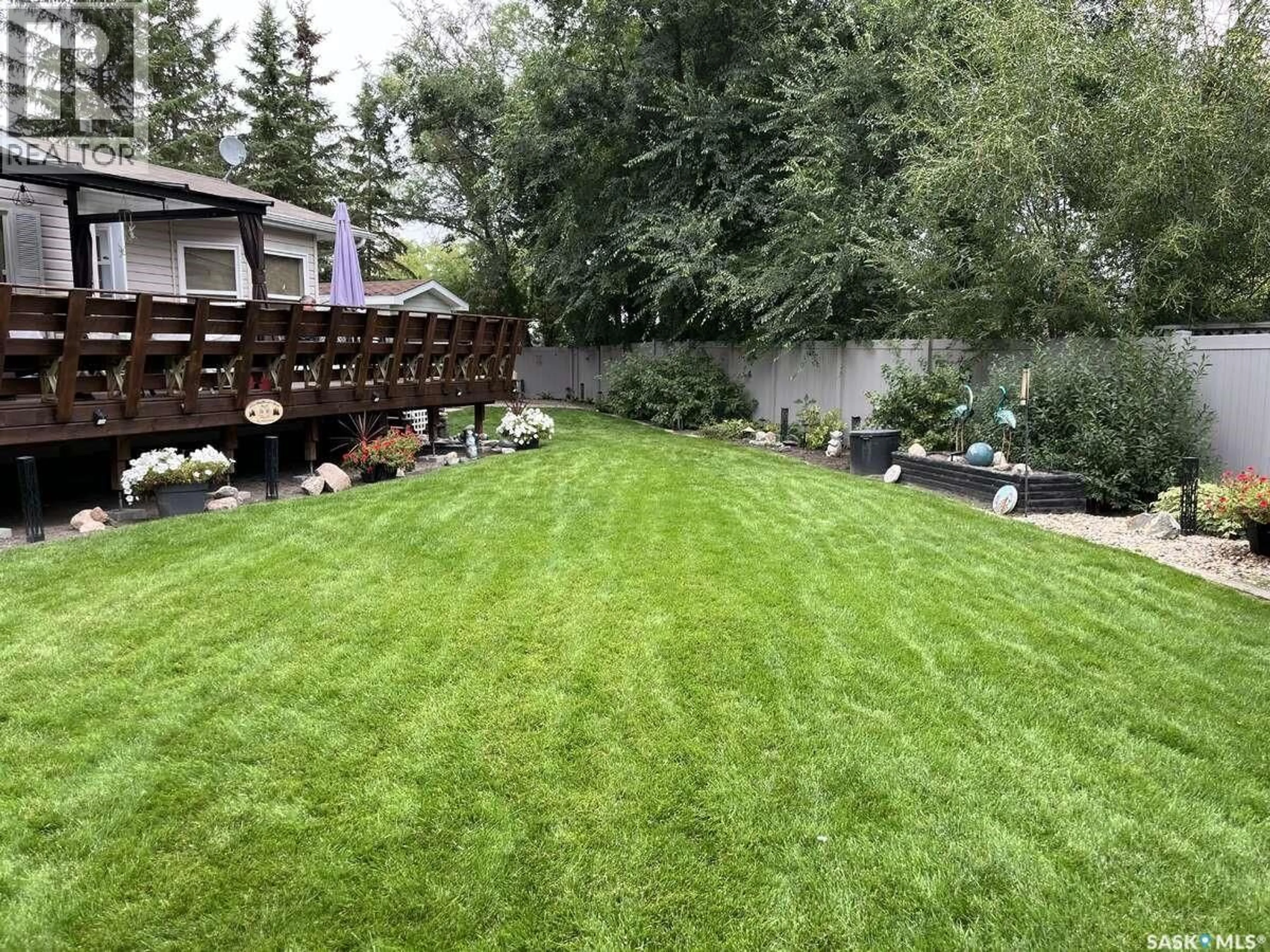 A pic from outside/outdoor area/front of a property/back of a property/a pic from drone, mountain view for 113 MINNOW CRESCENT, Island View Saskatchewan S0G0L0