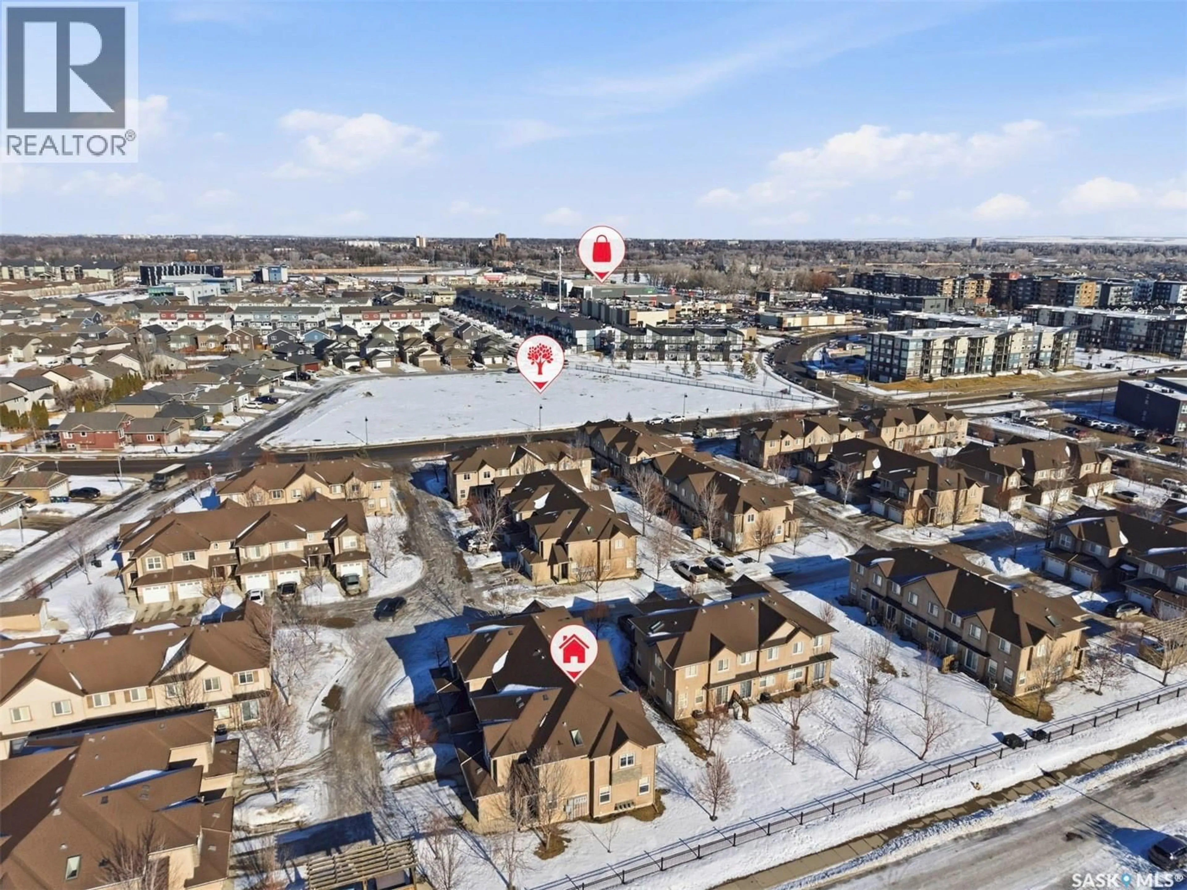 A pic from outside/outdoor area/front of a property/back of a property/a pic from drone, street for 710 - 401 GORDON ROAD, Saskatoon Saskatchewan S7T0J5