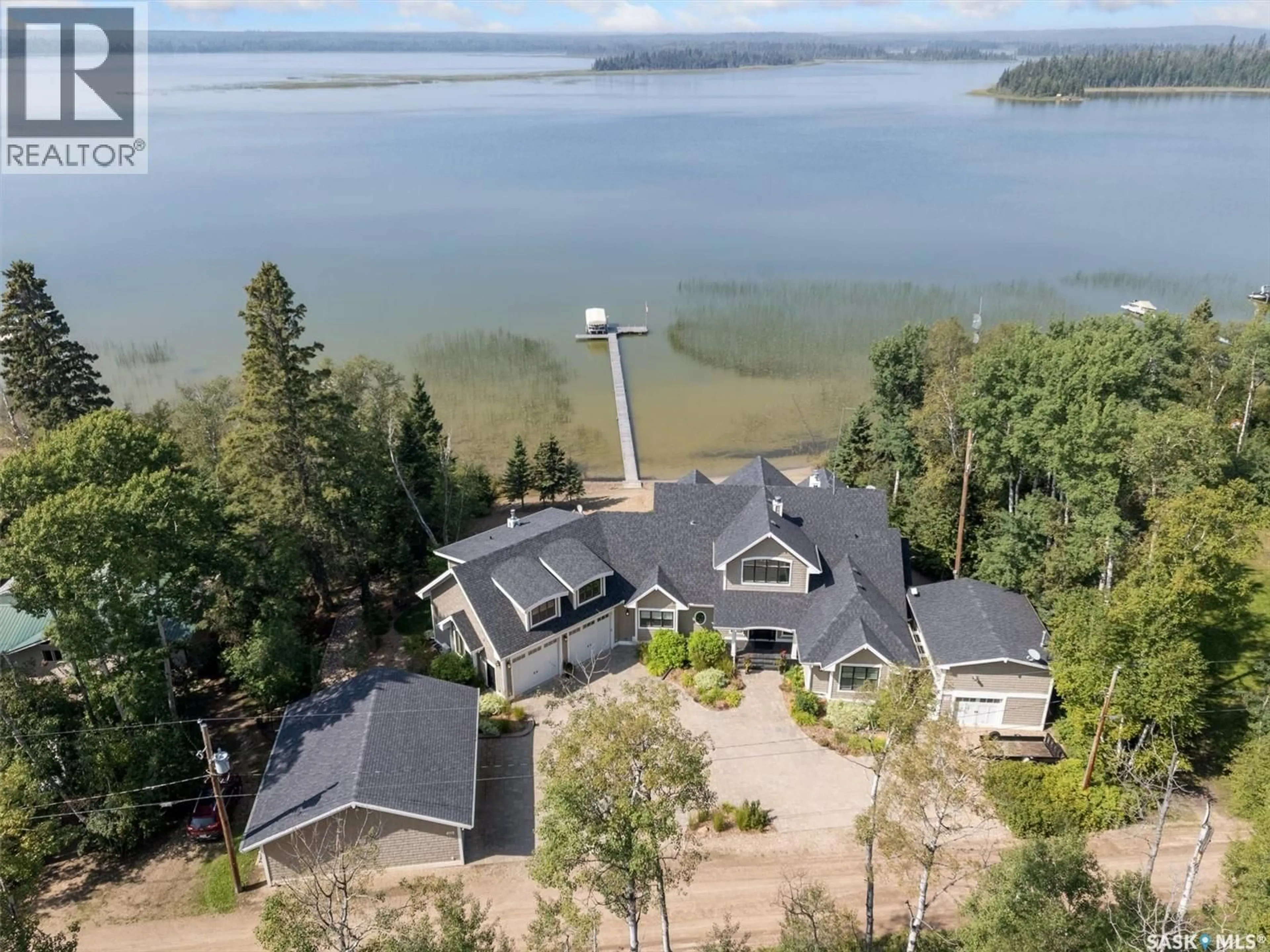 A pic from outside/outdoor area/front of a property/back of a property/a pic from drone, water/lake/river/ocean view for 210 OKEMA TRAIL, Lakeland Rm No. 521 Saskatchewan S0J0N0