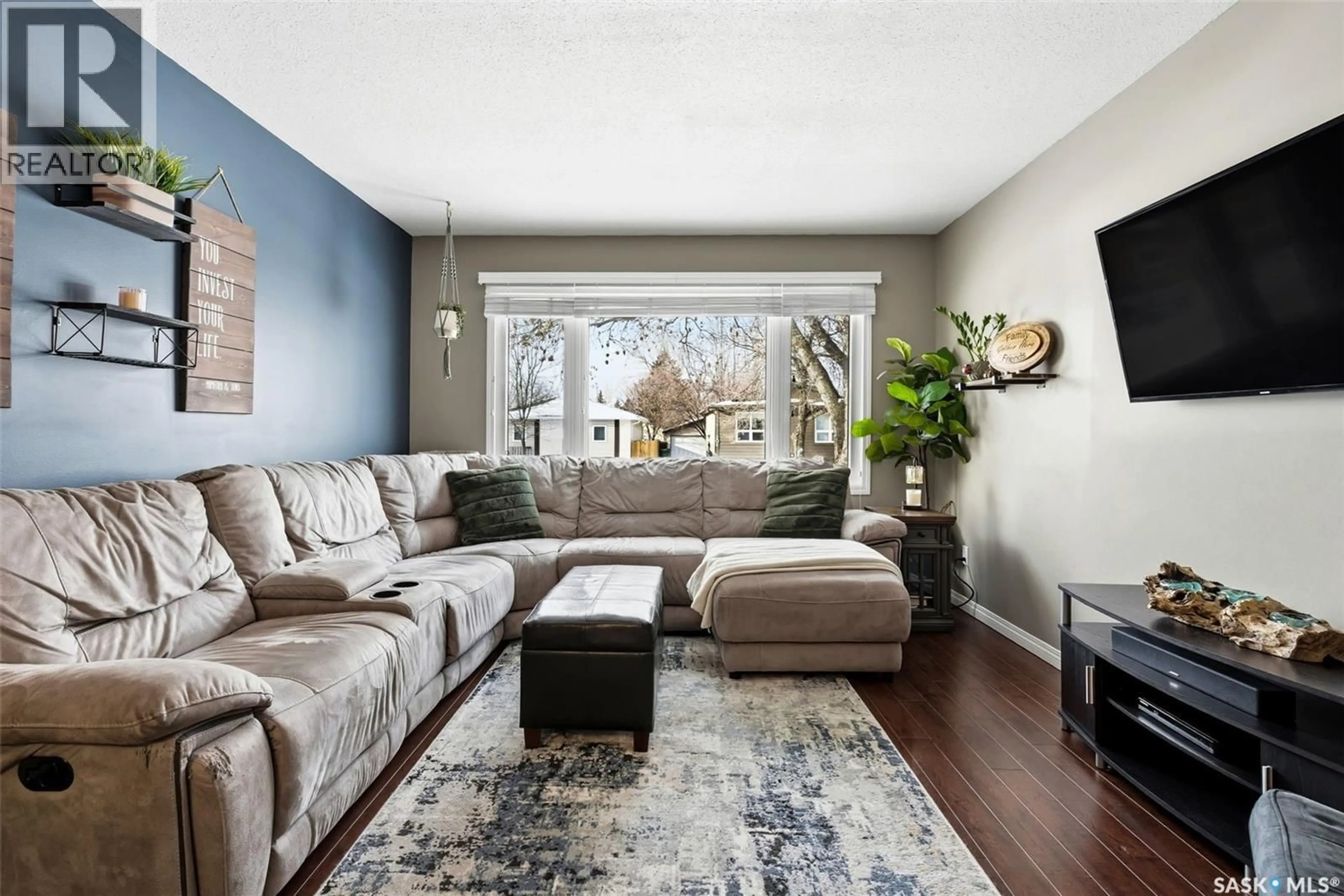 Living room with furniture, unknown for 207 PAYNTER CRESCENT, Regina Saskatchewan S4X2A9