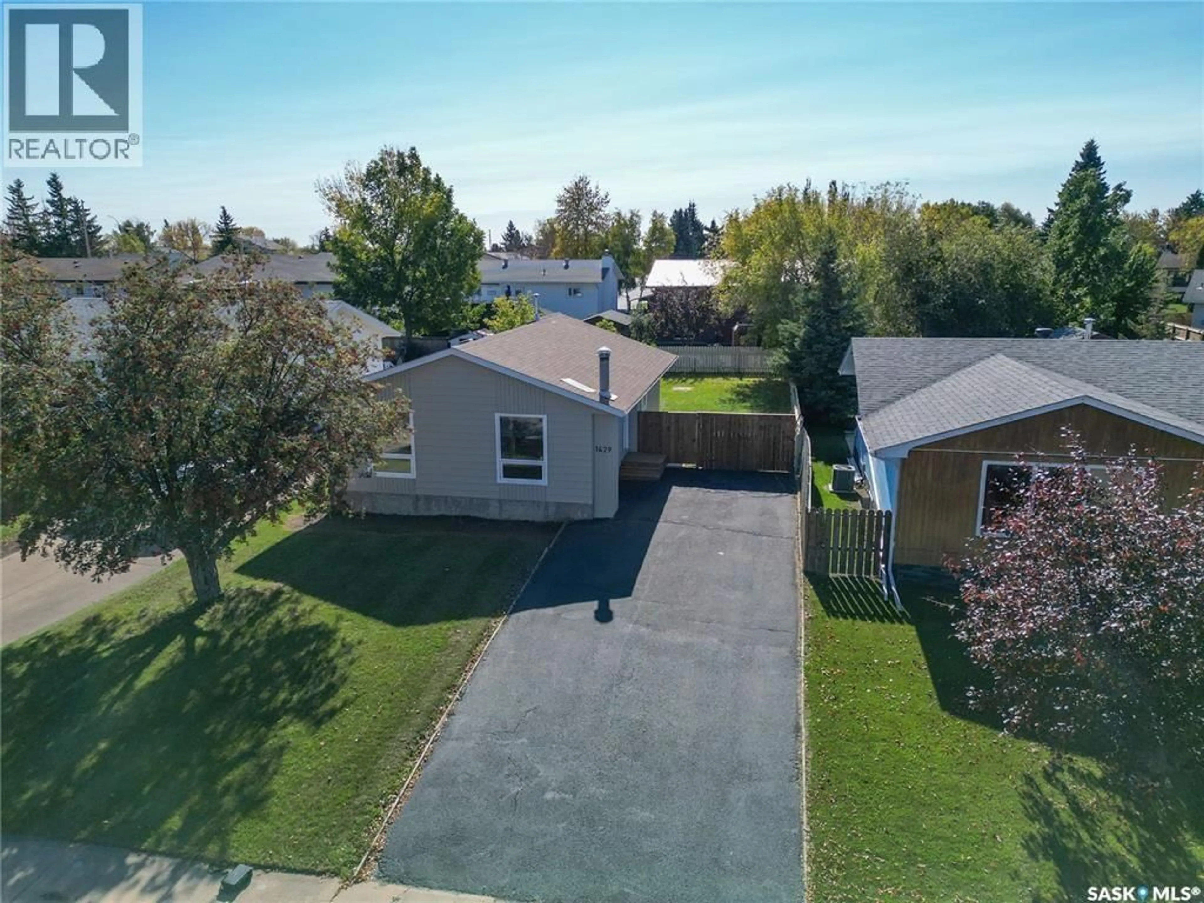 A pic from outside/outdoor area/front of a property/back of a property/a pic from drone, street for 1429 LACROIX CRESCENT, Prince Albert Saskatchewan S6V6R6