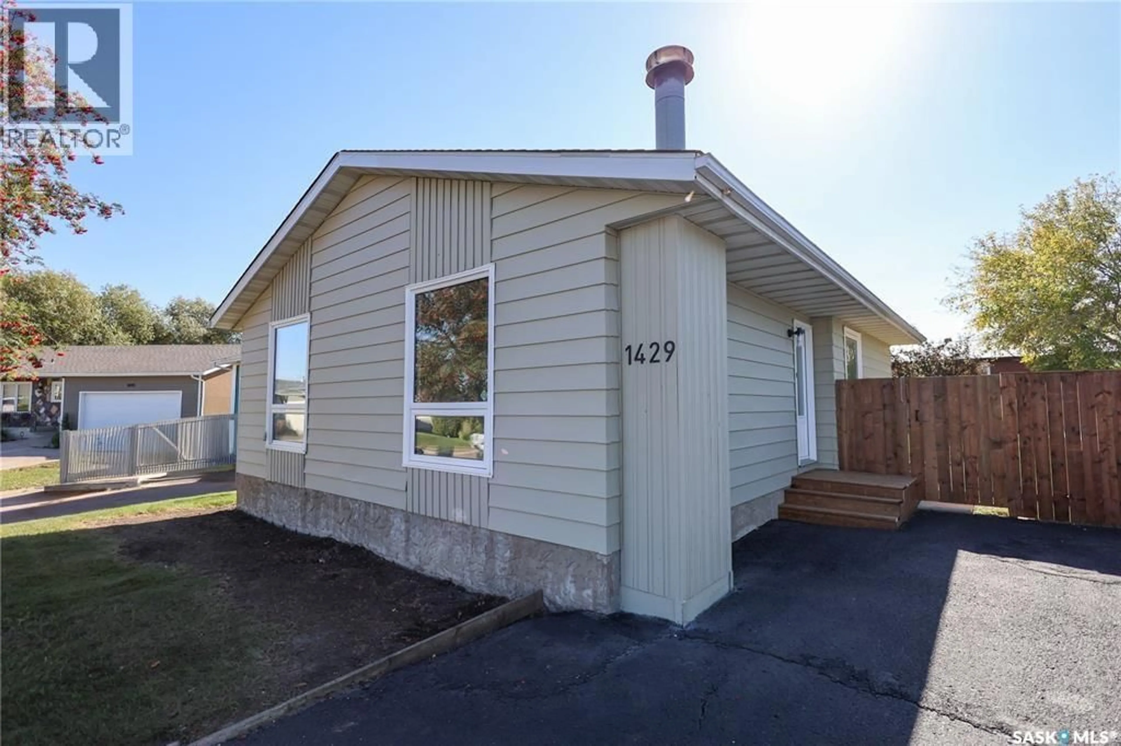 Home with vinyl exterior material, street for 1429 LACROIX CRESCENT, Prince Albert Saskatchewan S6V6R6