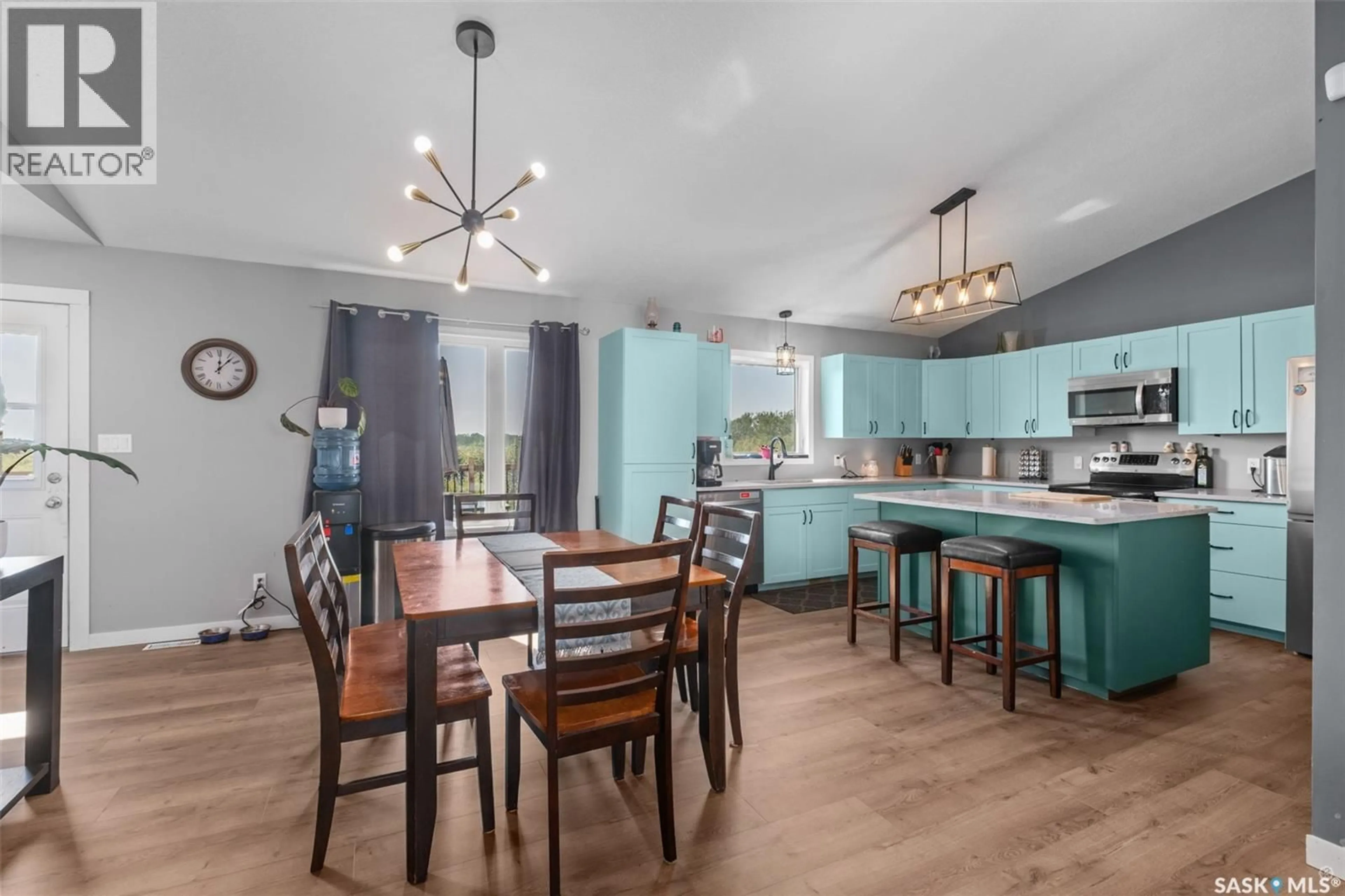 Open concept kitchen, wood/laminate floor for BUCKLAND ACREAGE, Buckland Rm No. 491 Saskatchewan S0J2N0