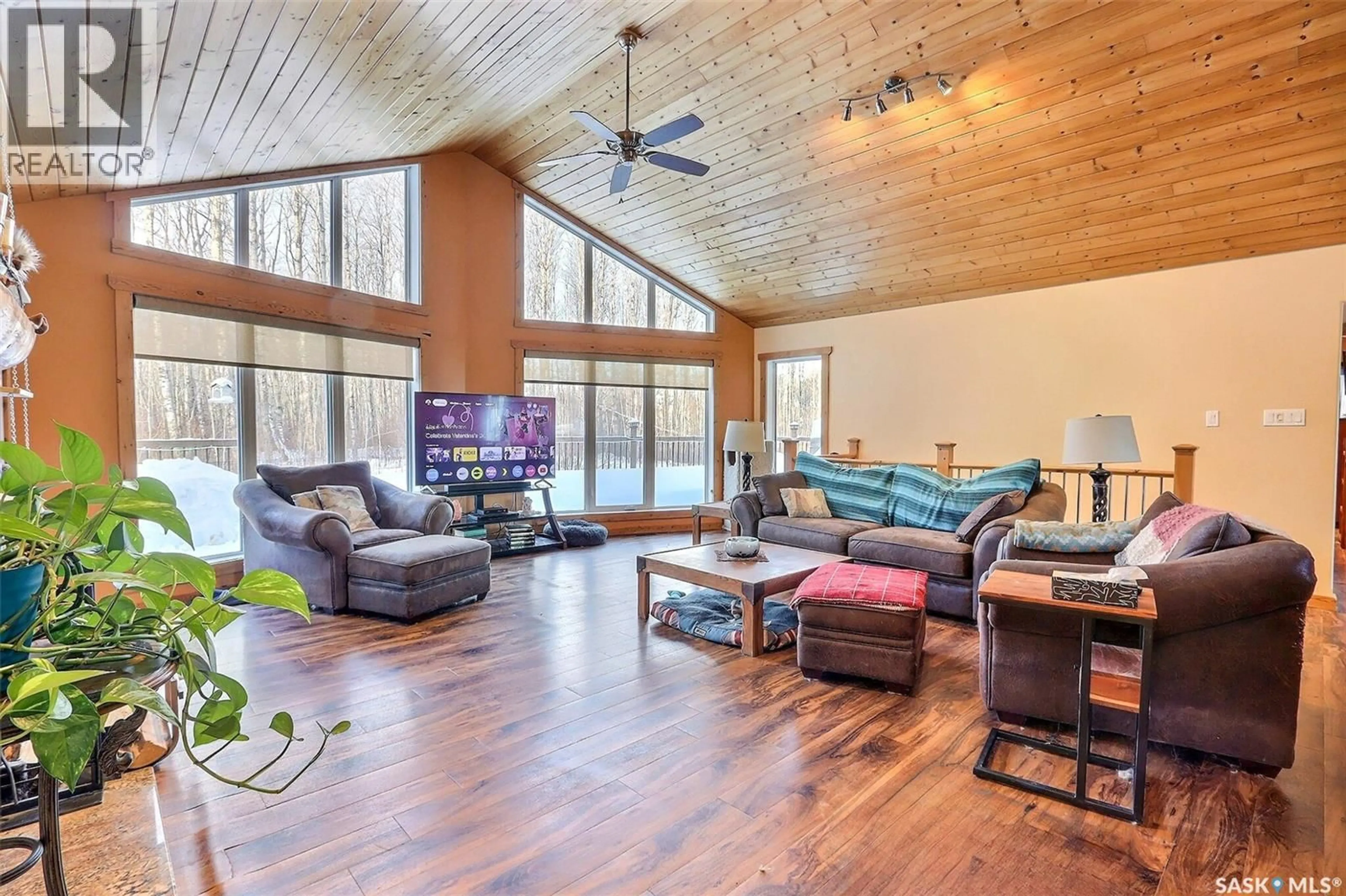 Living room with furniture, wood/laminate floor for 960 BOUNDARY ROAD, Lakeland Rm No. 521 Saskatchewan S0J0N0