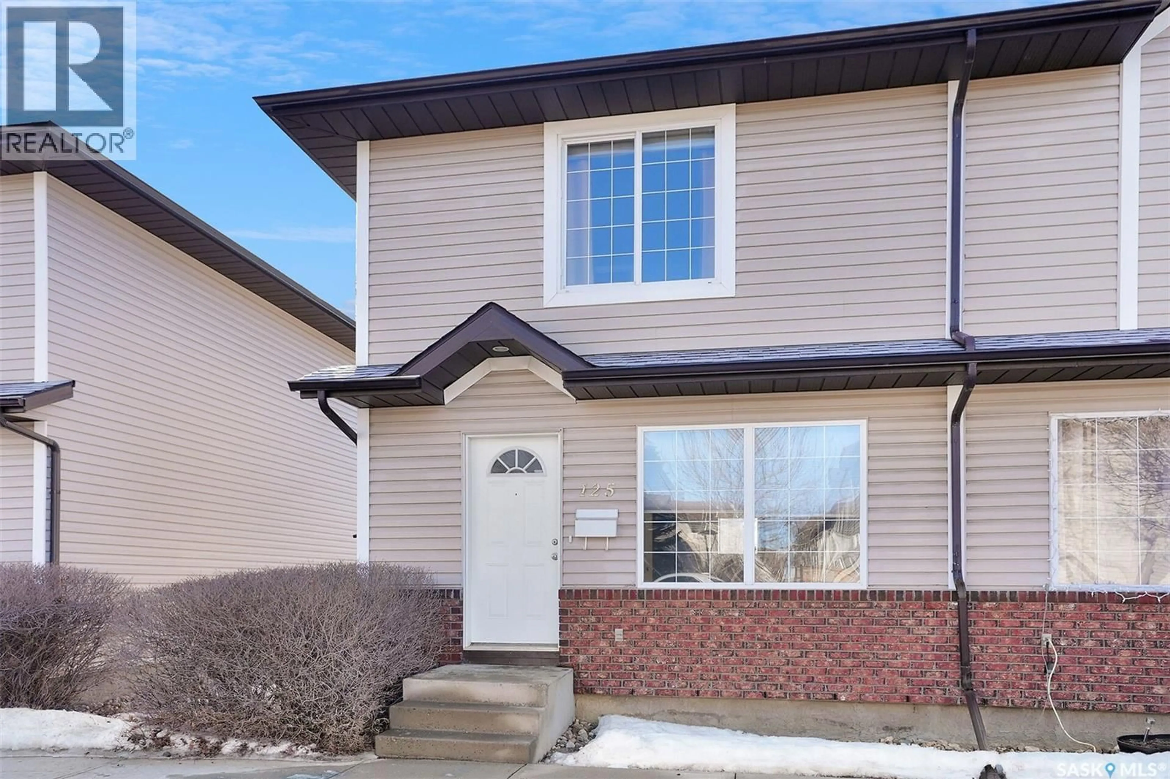 Home with vinyl exterior material, street for 125 4601 CHILD AVENUE, Regina Saskatchewan S4X0A1