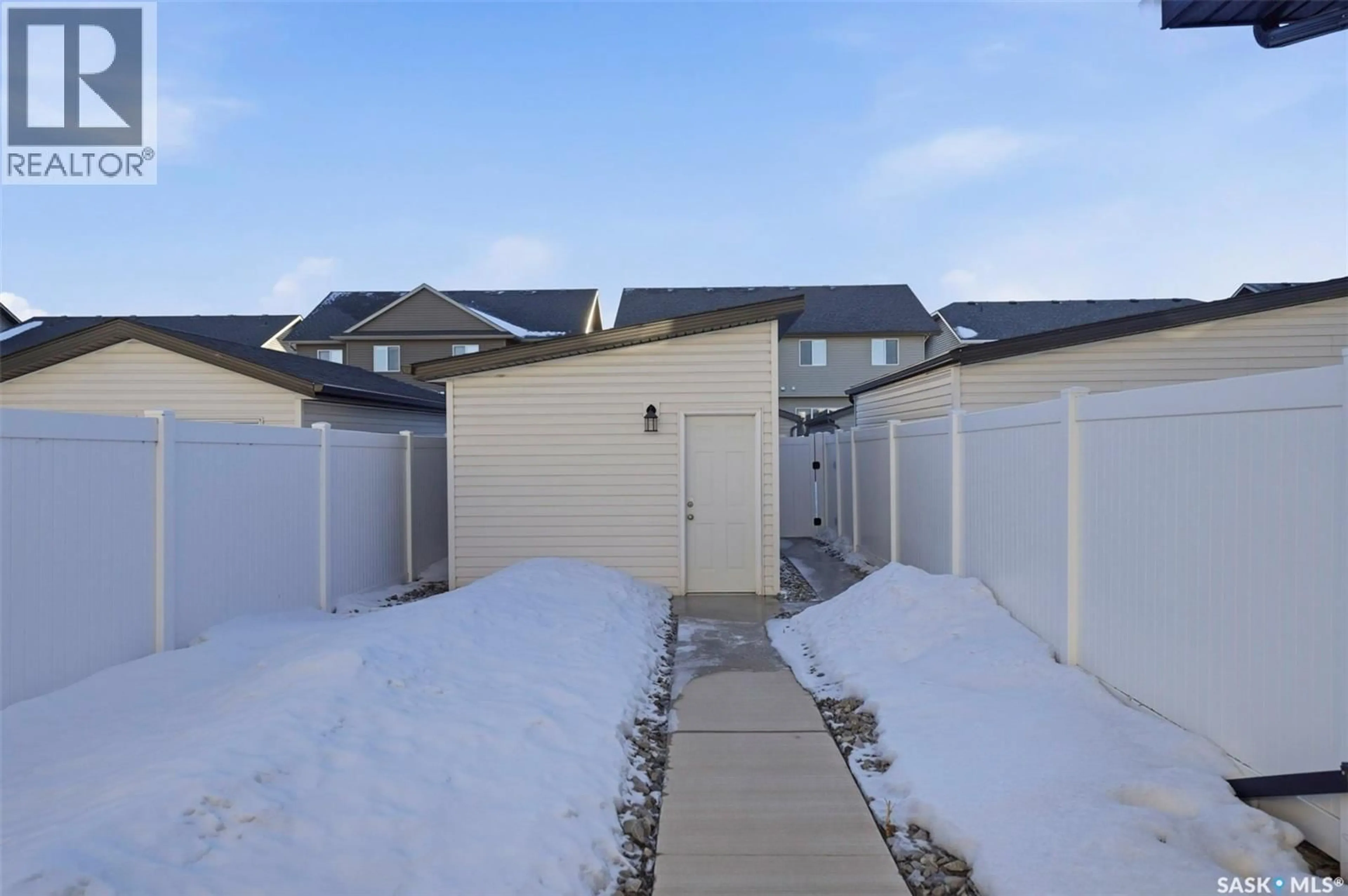 A pic from outside/outdoor area/front of a property/back of a property/a pic from drone, street for 316 MCFAULL CRESCENT, Saskatoon Saskatchewan S0K2T0