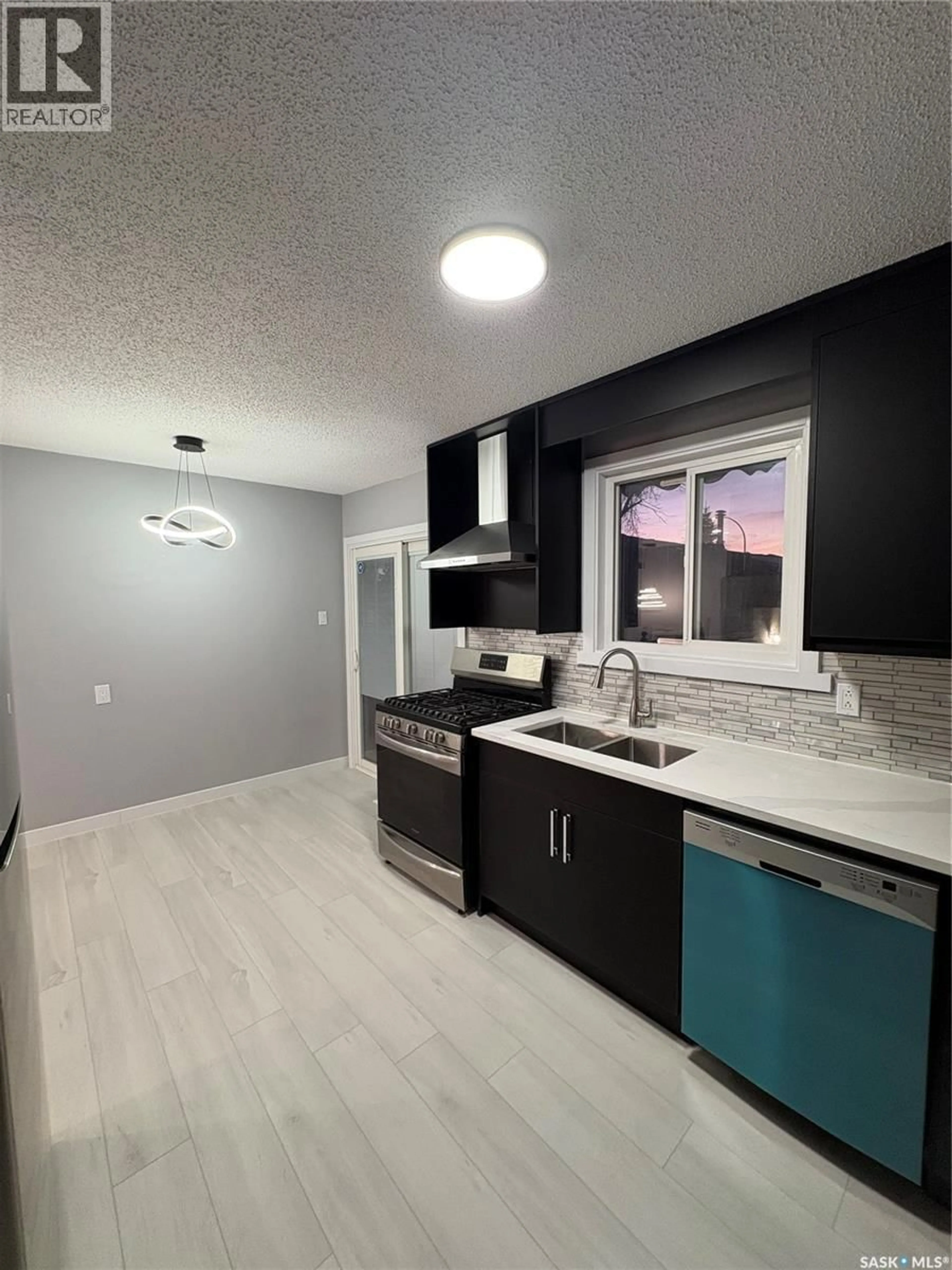 Open concept kitchen, ceramic/tile floor for 101 ST LAURENT CRESCENT, Saskatoon Saskatchewan S7L7L2