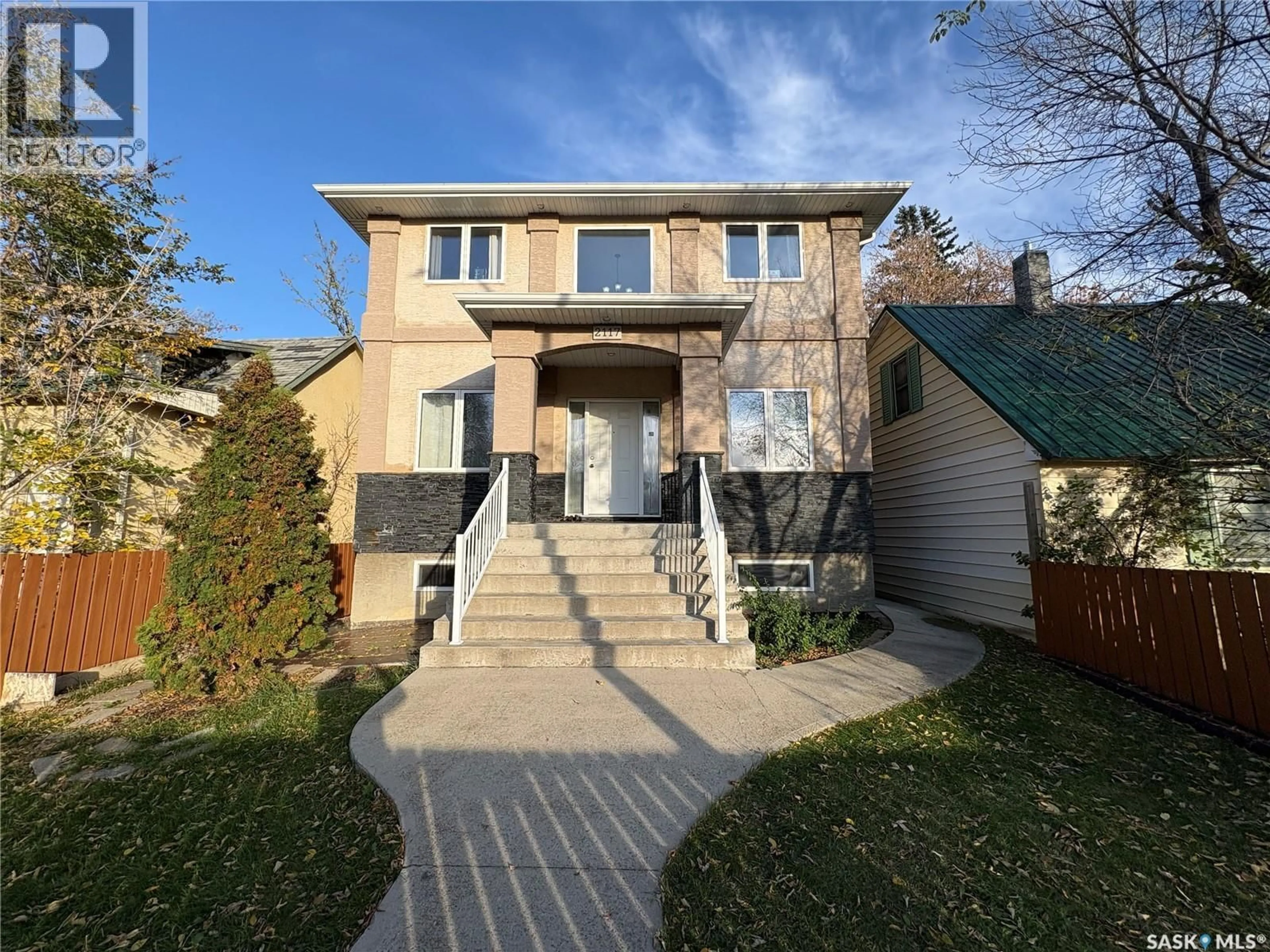 Home with brick exterior material, street for 2117 BRODER STREET, Regina Saskatchewan S4N3S5