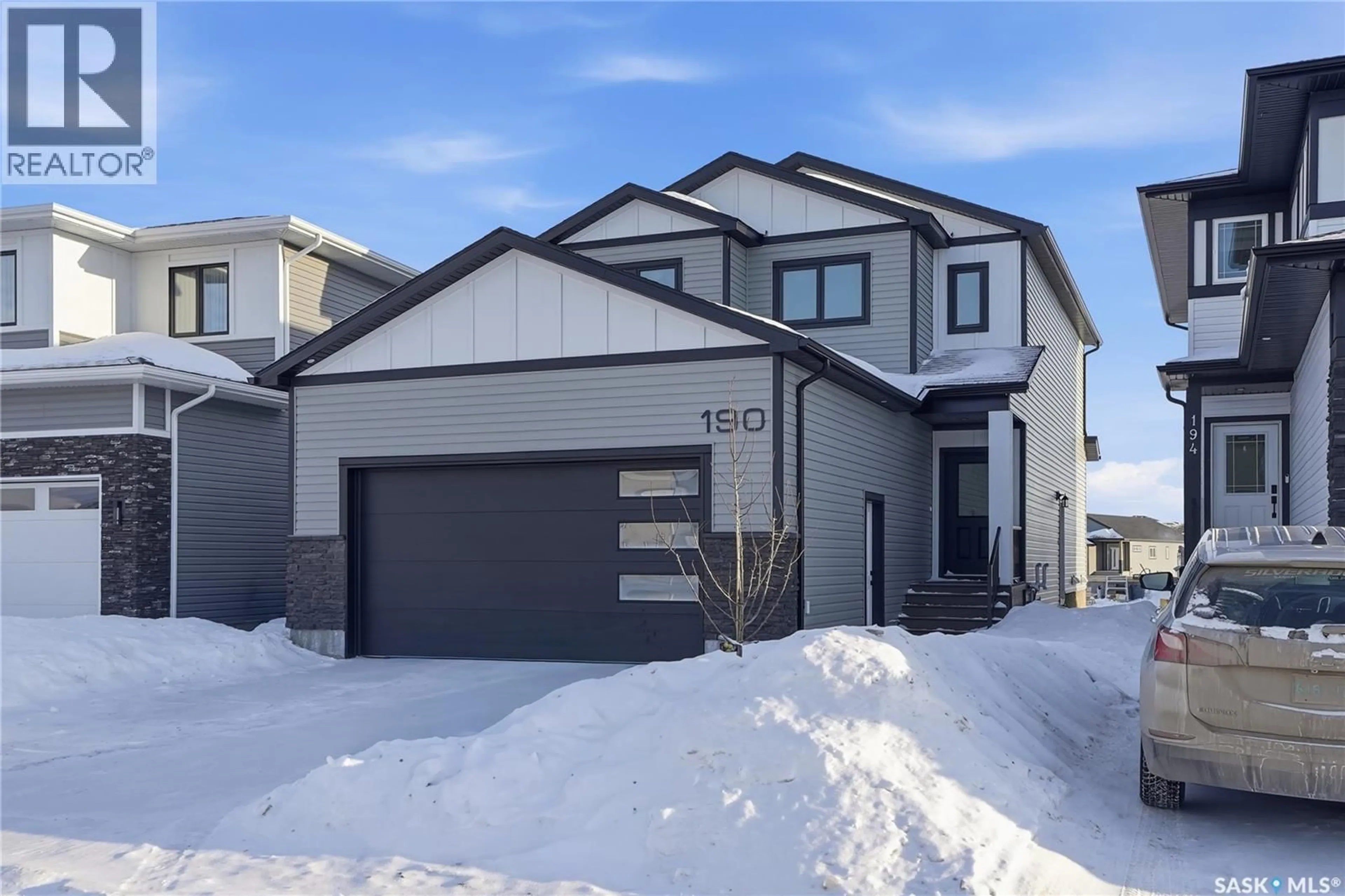 Home with vinyl exterior material, street for 190 DORAN WAY, Saskatoon Saskatchewan S7V0Z7