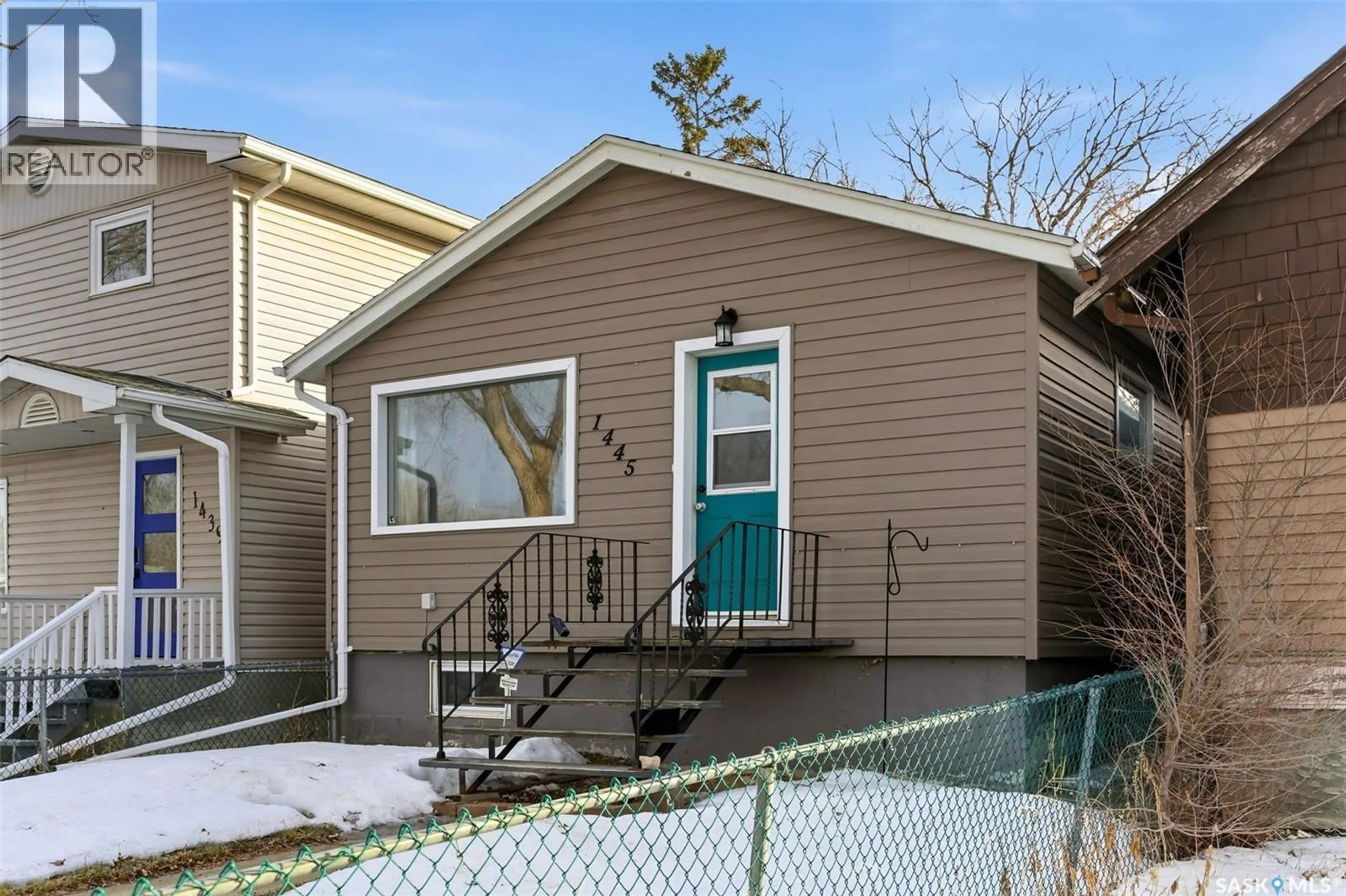 Home with vinyl exterior material, street for 1445 CONNAUGHT STREET, Regina Saskatchewan S4T4T1