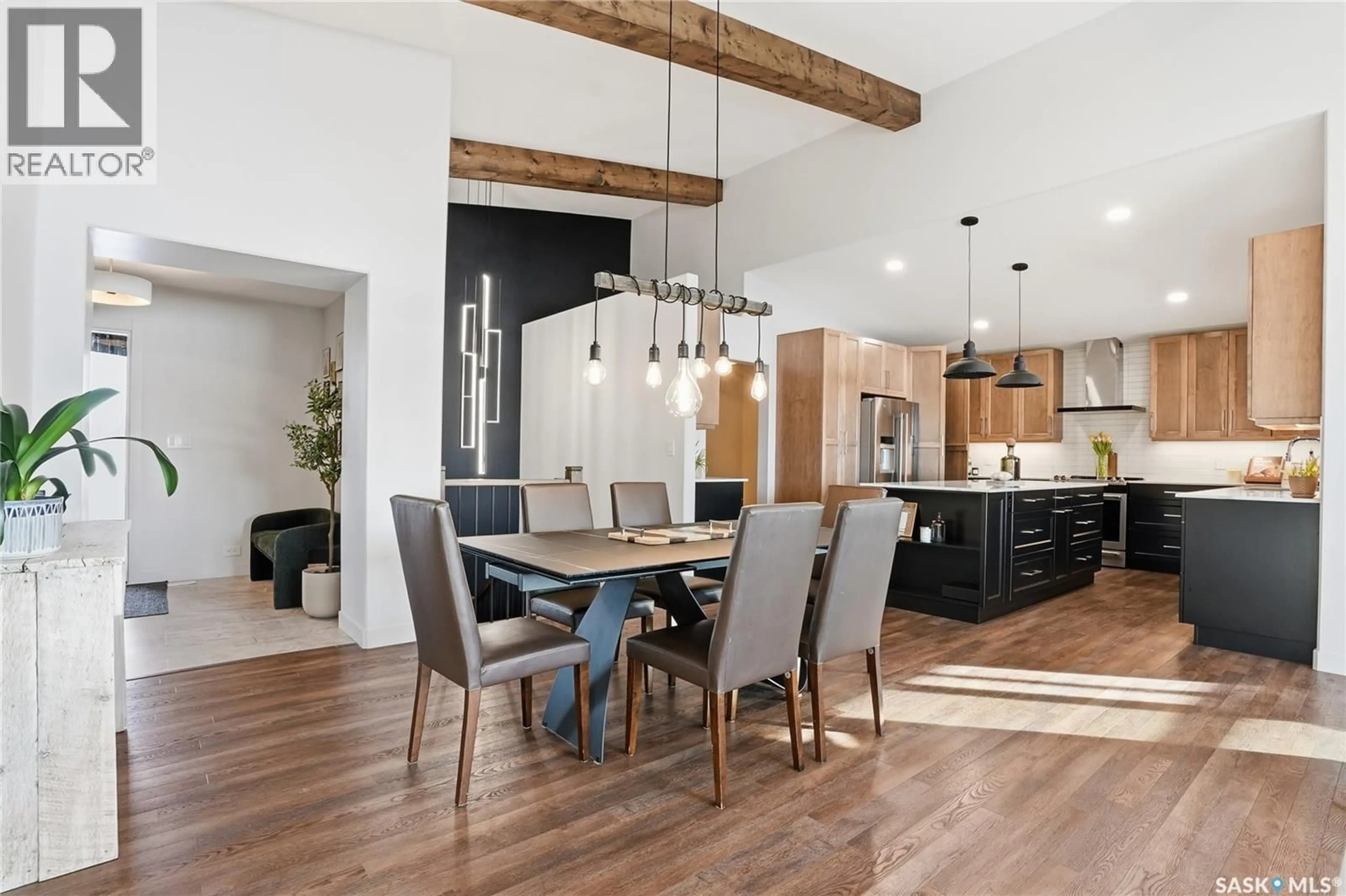 Open concept kitchen, wood/laminate floor for 520 16TH AVENUE, Humboldt Saskatchewan S0K2A0