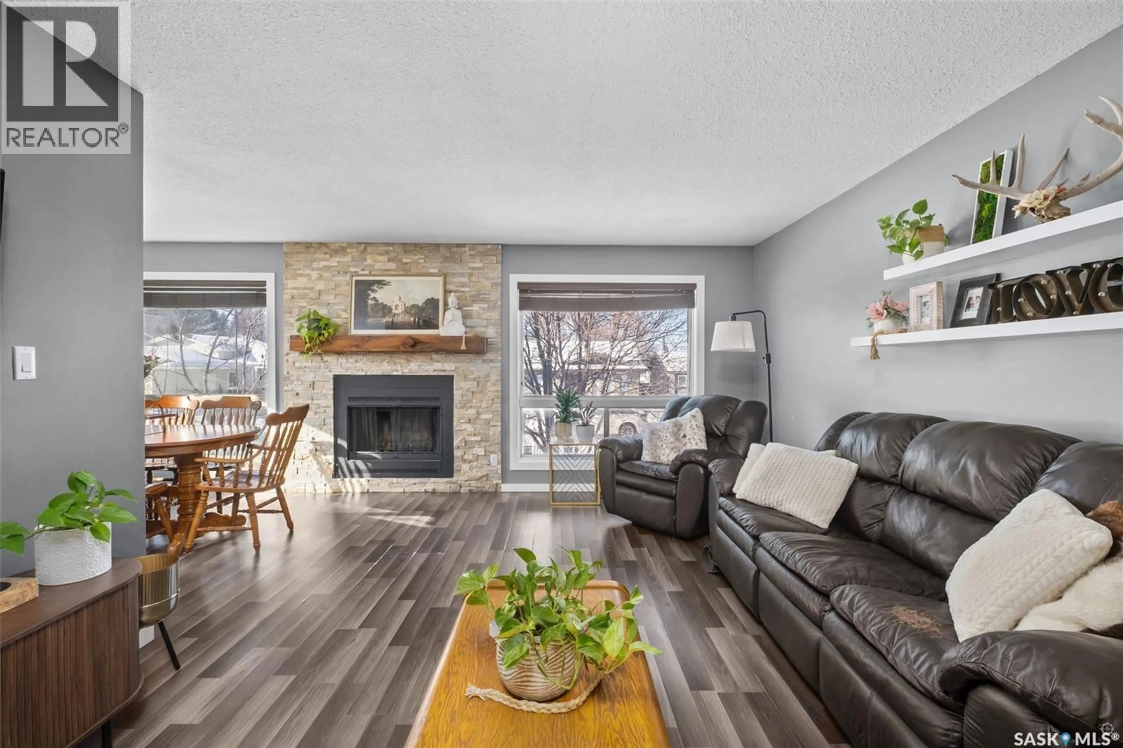 Living room with furniture, wood/laminate floor for 866 SPENCER DRIVE, Prince Albert Saskatchewan S6V7C9