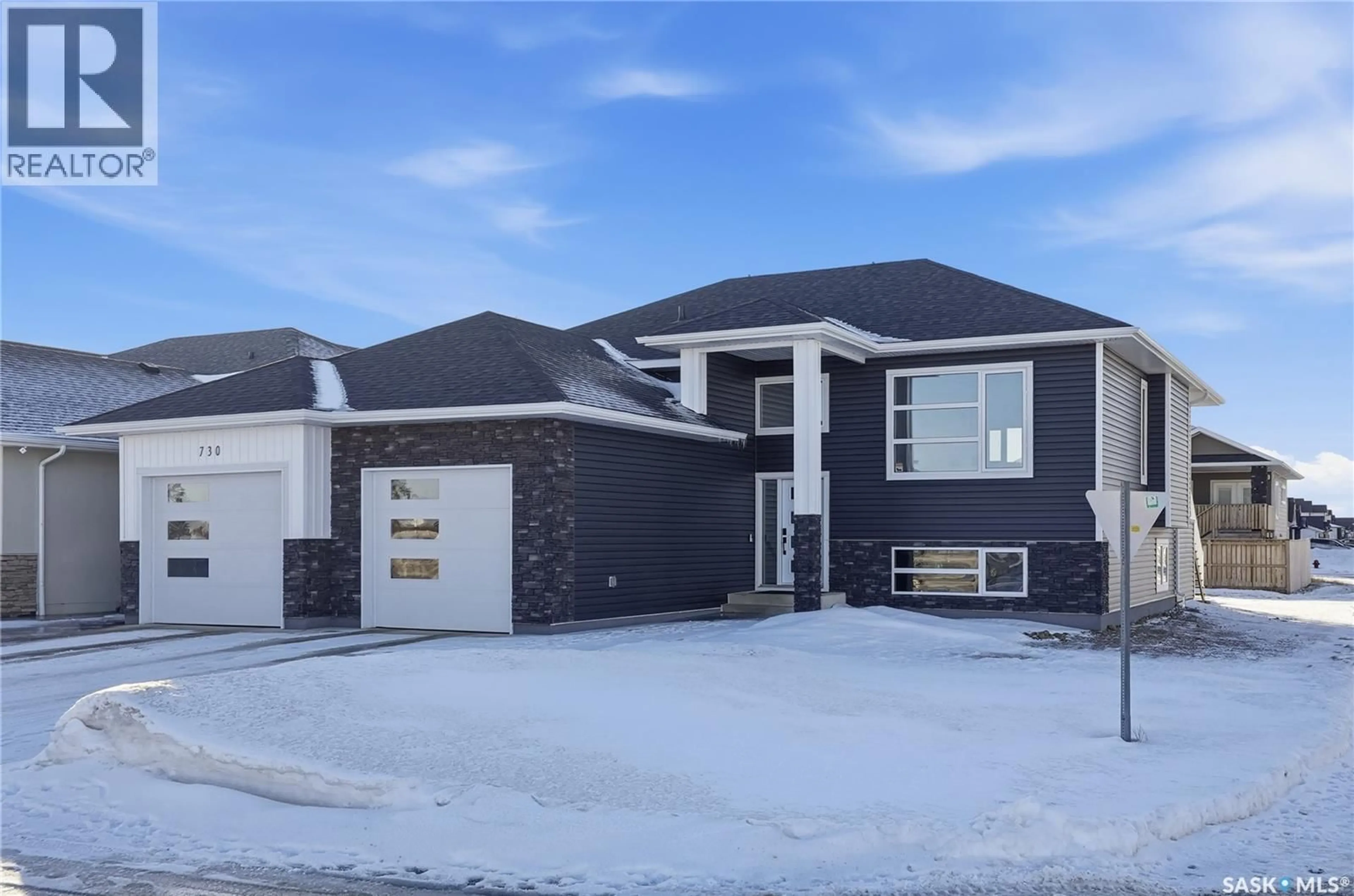 Home with brick exterior material, street for 818 BALLESTEROS CRESCENT, Warman Saskatchewan S0K4S3