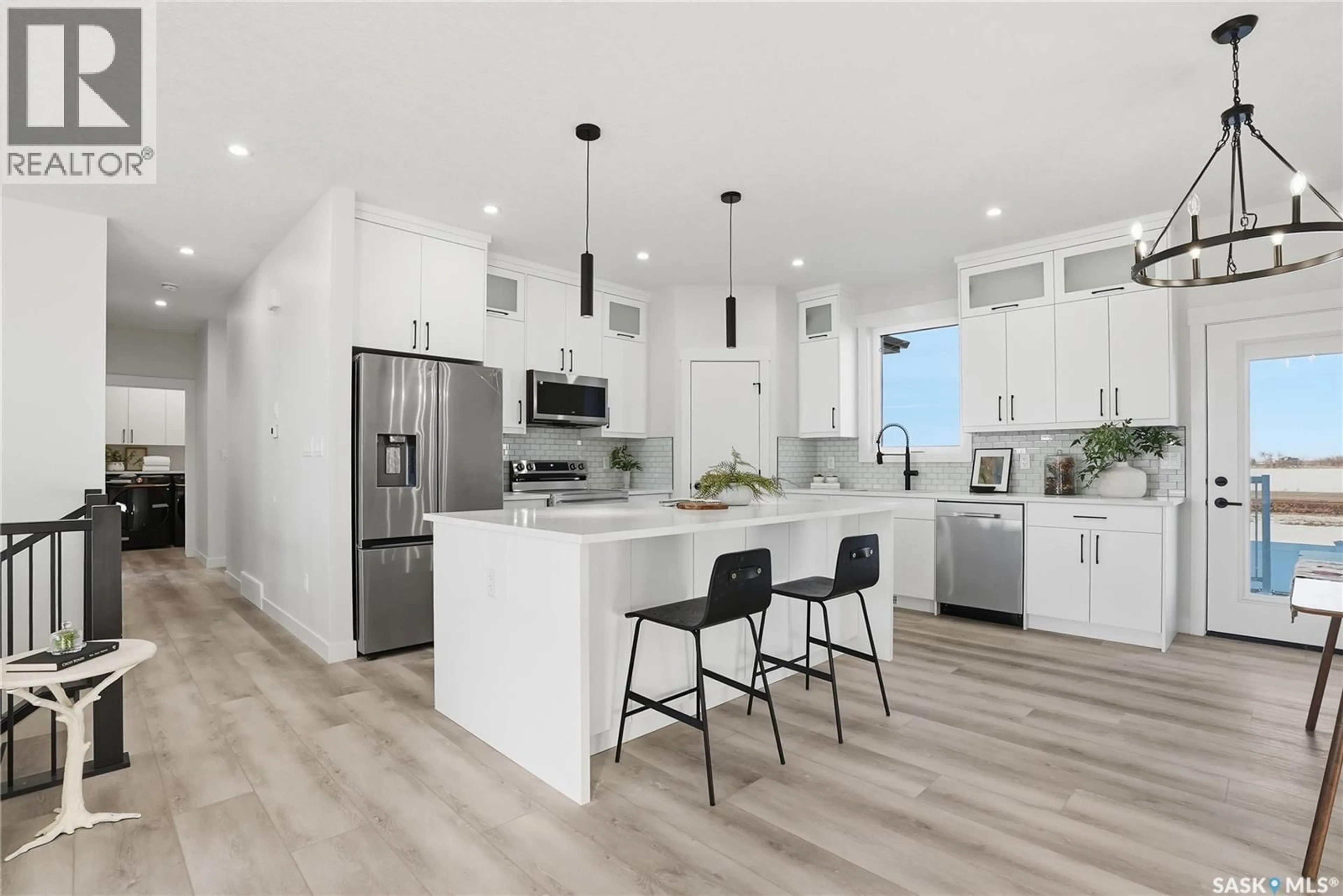 Open concept kitchen, unknown for 818 BALLESTEROS CRESCENT, Warman Saskatchewan S0K4S3