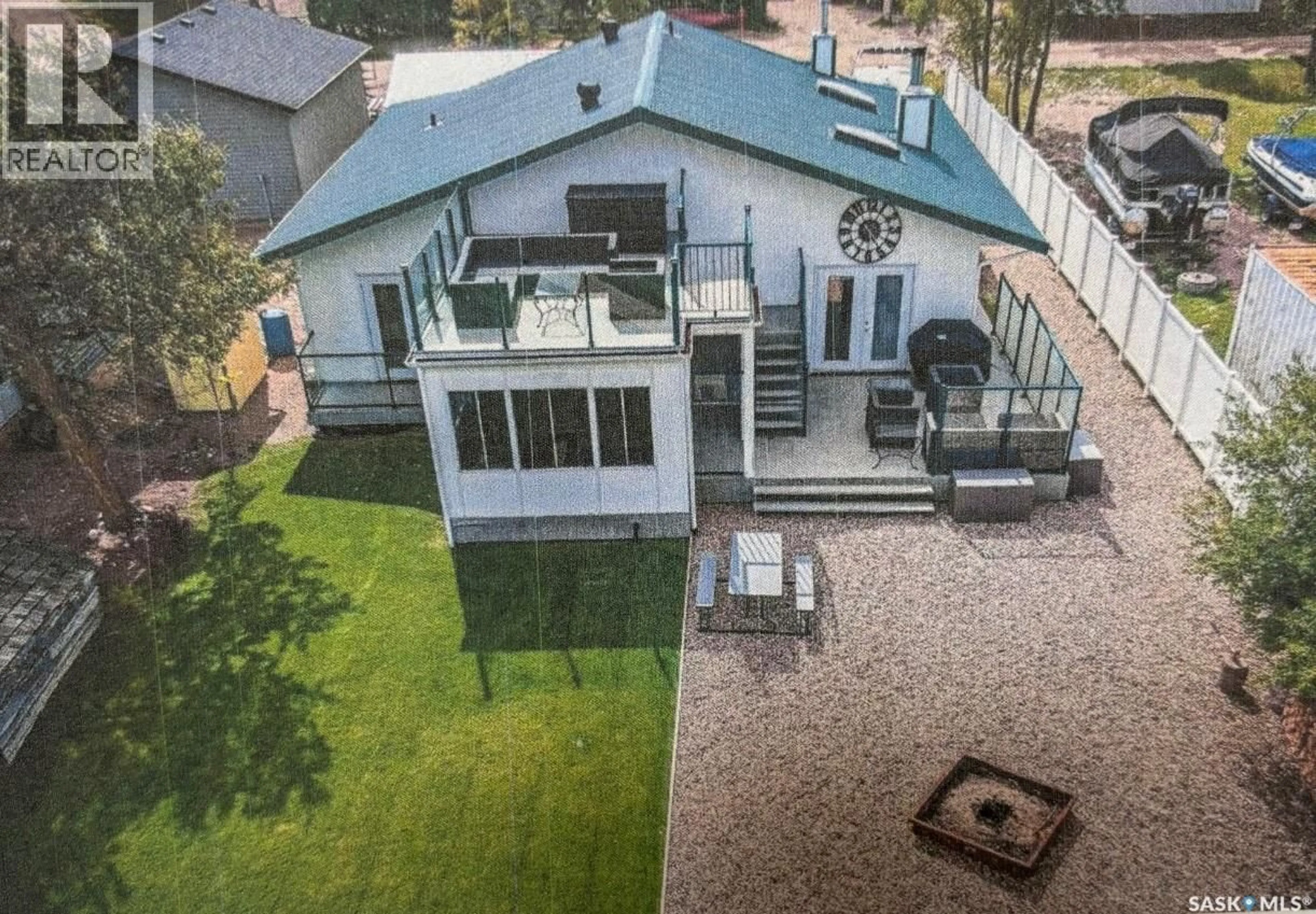 A pic from outside/outdoor area/front of a property/back of a property/a pic from drone, unknown for 108 IROQUOIS LAKE DRIVE, Iroquois Lake Saskatchewan S0J2G0