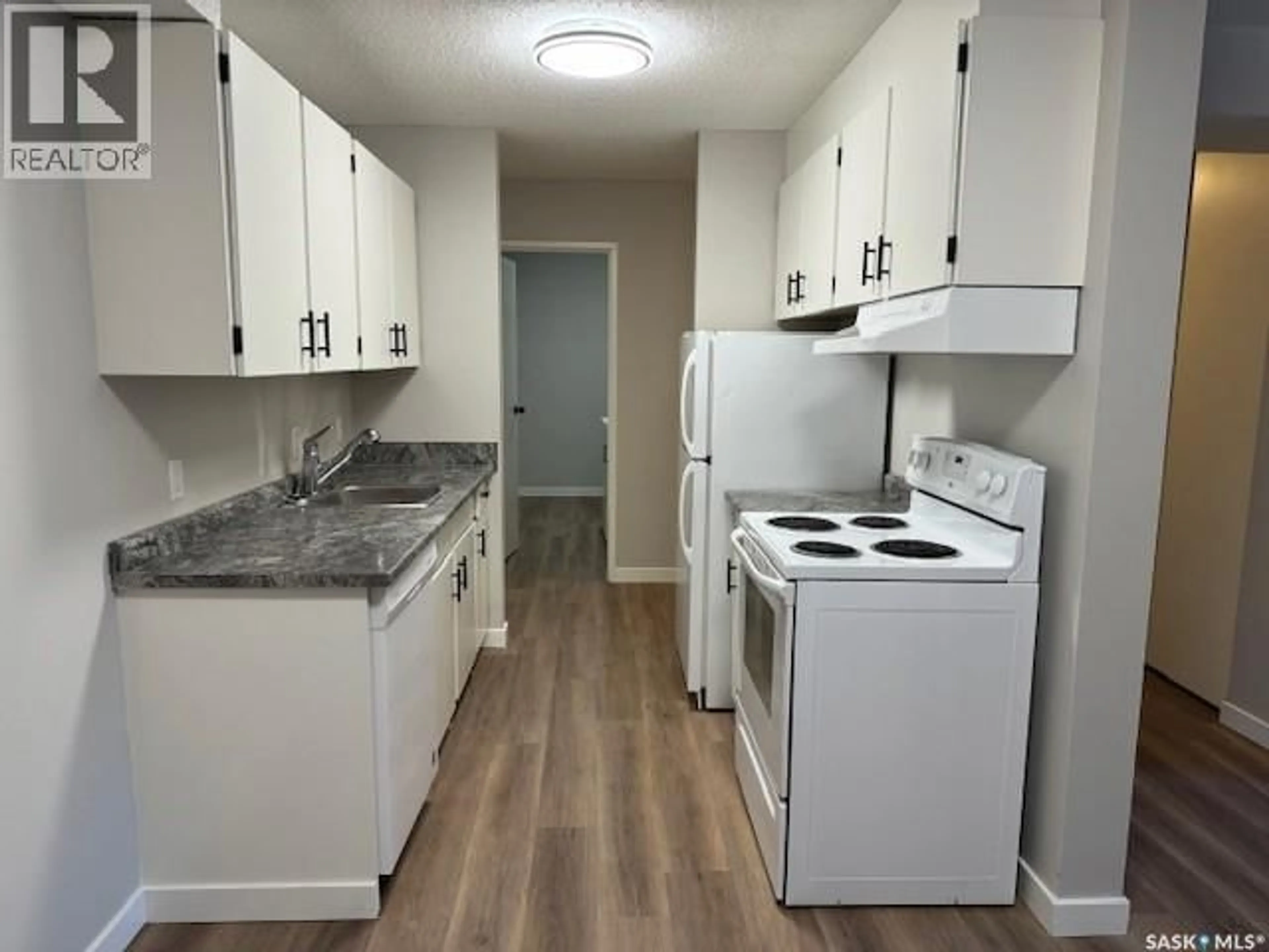 Standard kitchen, wood/laminate floor for 101 - 1902 PEARSON AVENUE, North Battleford Saskatchewan S9A2W4