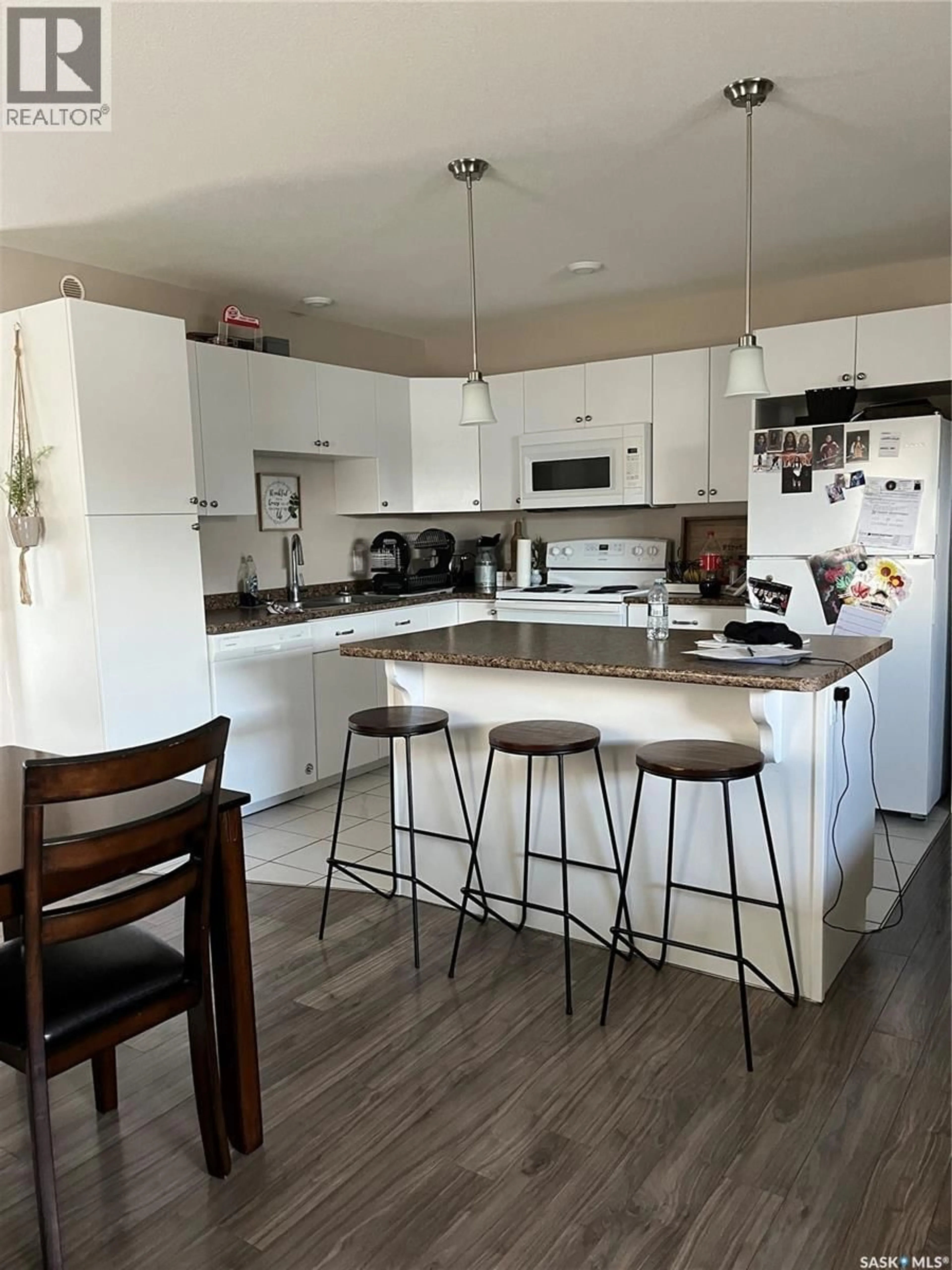 Open concept kitchen, unknown for 833/835 5TH STREET, Prince Albert Saskatchewan S6V2L6