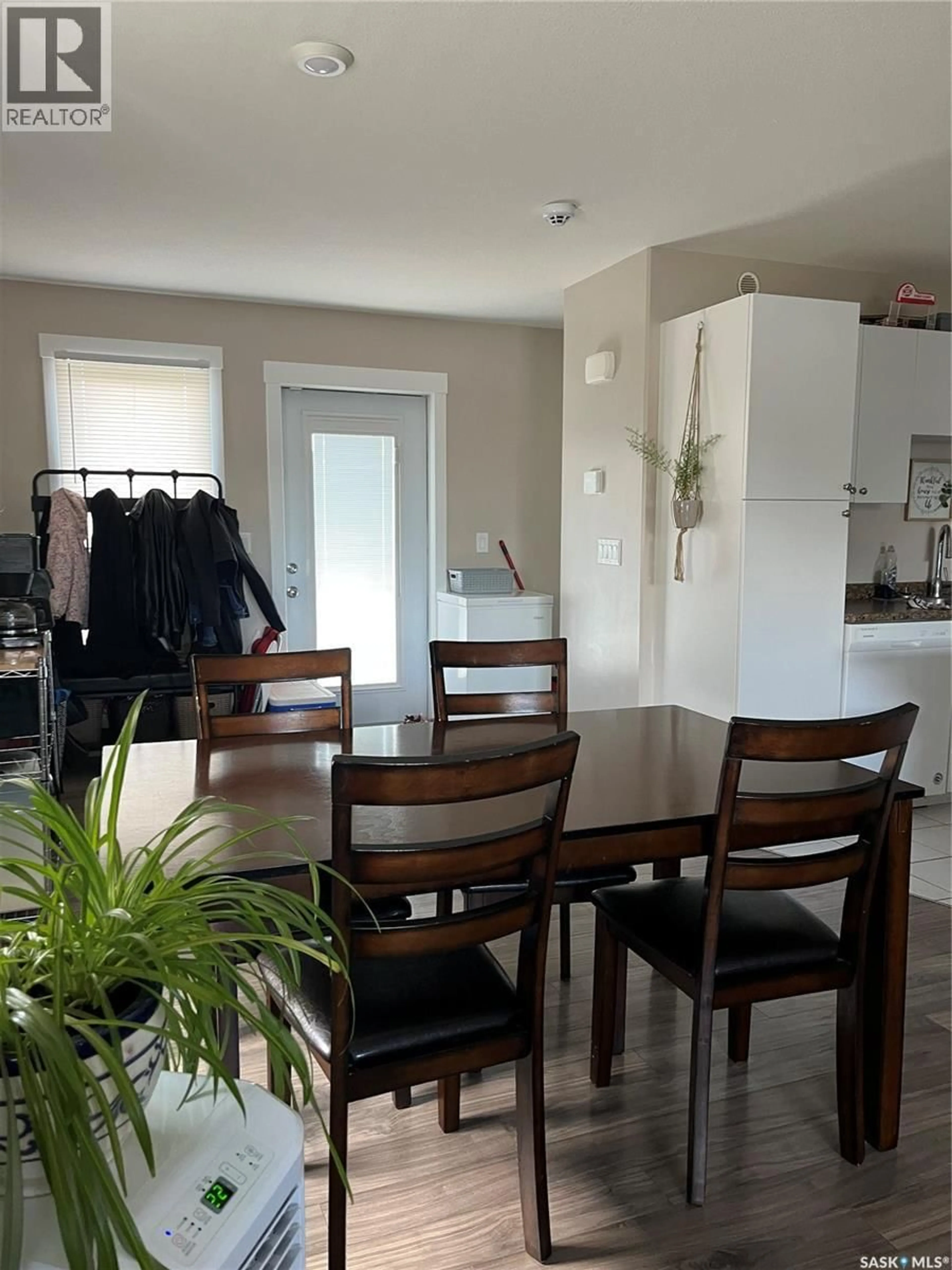 Dining room, wood/laminate floor for 833/835 5TH STREET, Prince Albert Saskatchewan S6V2L6