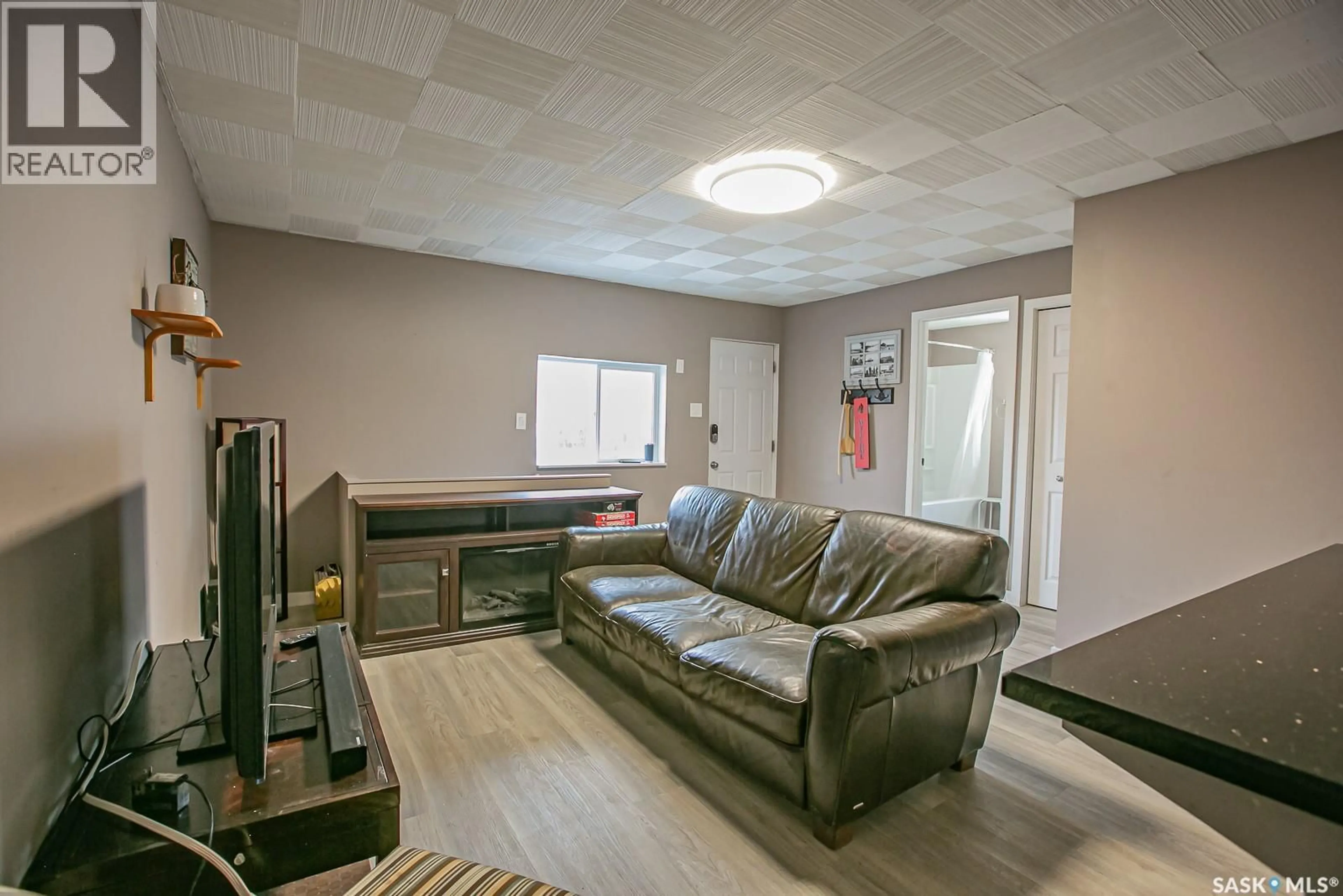 Living room with furniture, unknown for 104 BRIERE DRIVE, Regina Beach Saskatchewan S0G4C0