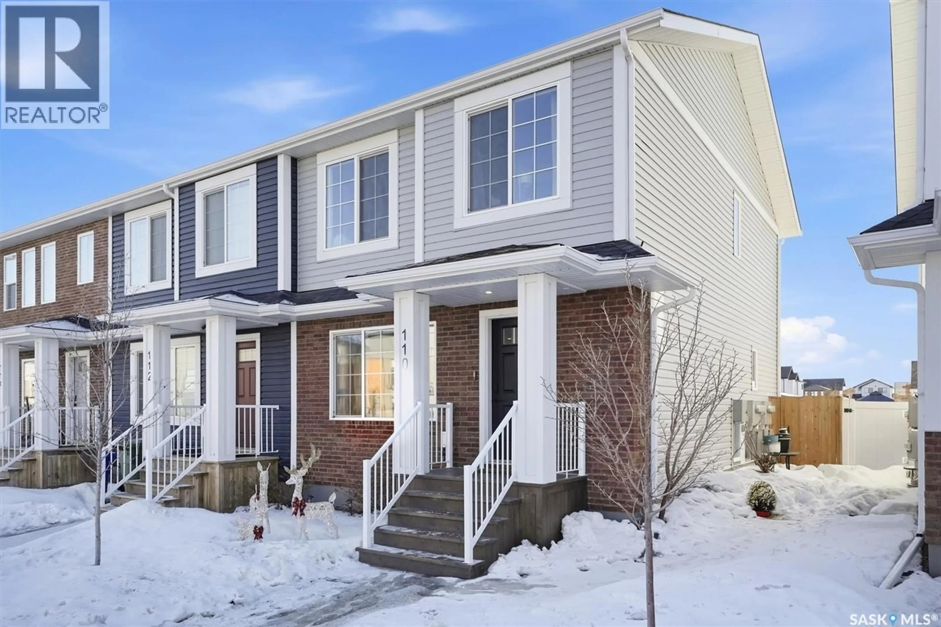 Home with vinyl exterior material, street for 110 WESTFIELD ROAD, Saskatoon Saskatchewan S7V0Z8