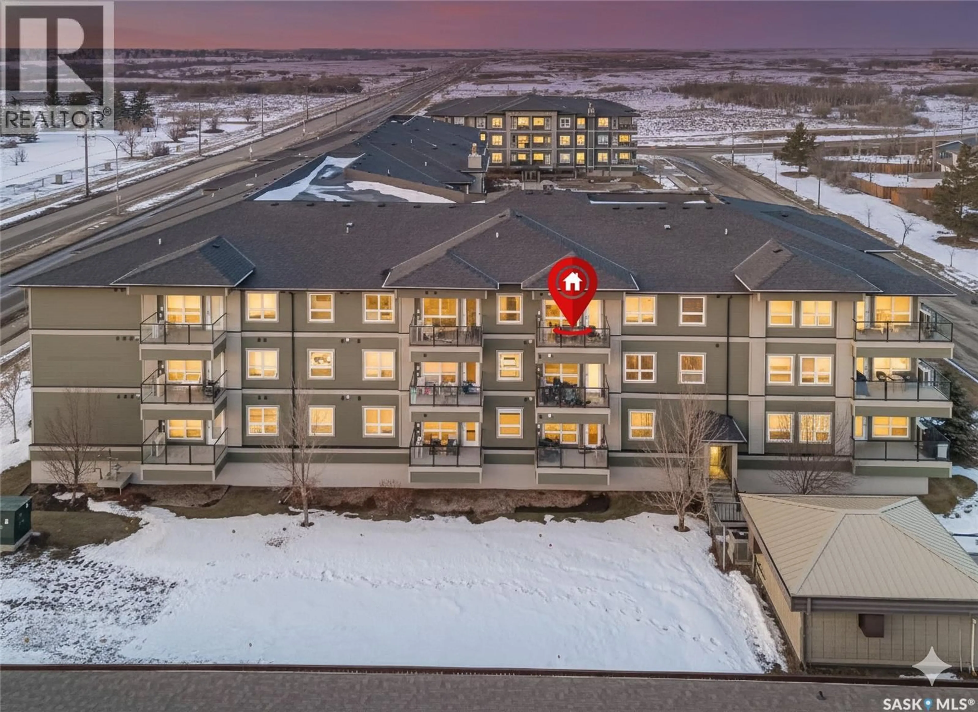 A pic from outside/outdoor area/front of a property/back of a property/a pic from drone, building for 915 - 316 KRISTJANSON ROAD, Saskatoon Saskatchewan S7S0B1