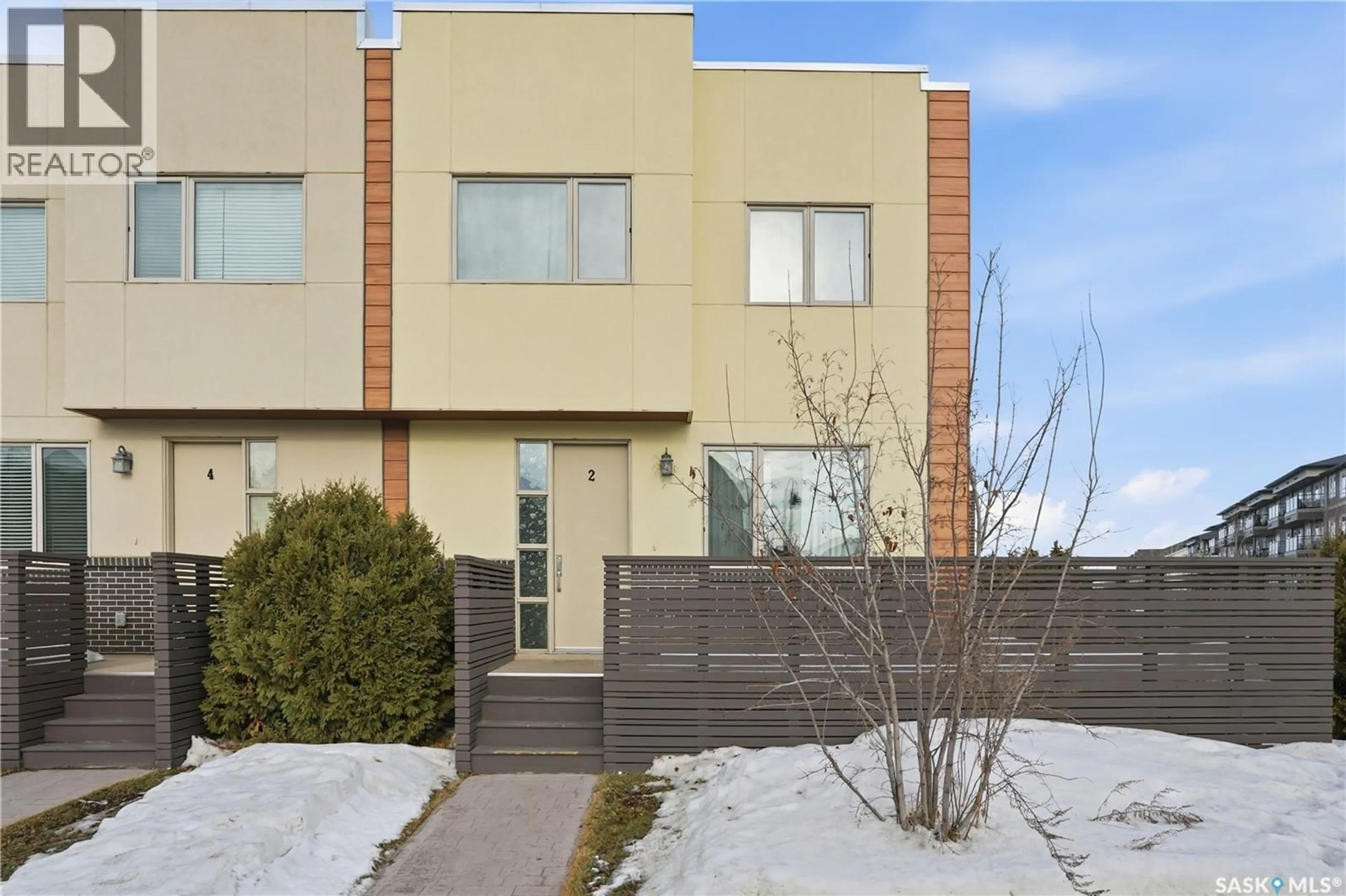 Home with brick exterior material, street for 2 103 WILLIS CRESCENT, Saskatoon Saskatchewan S7T0X9