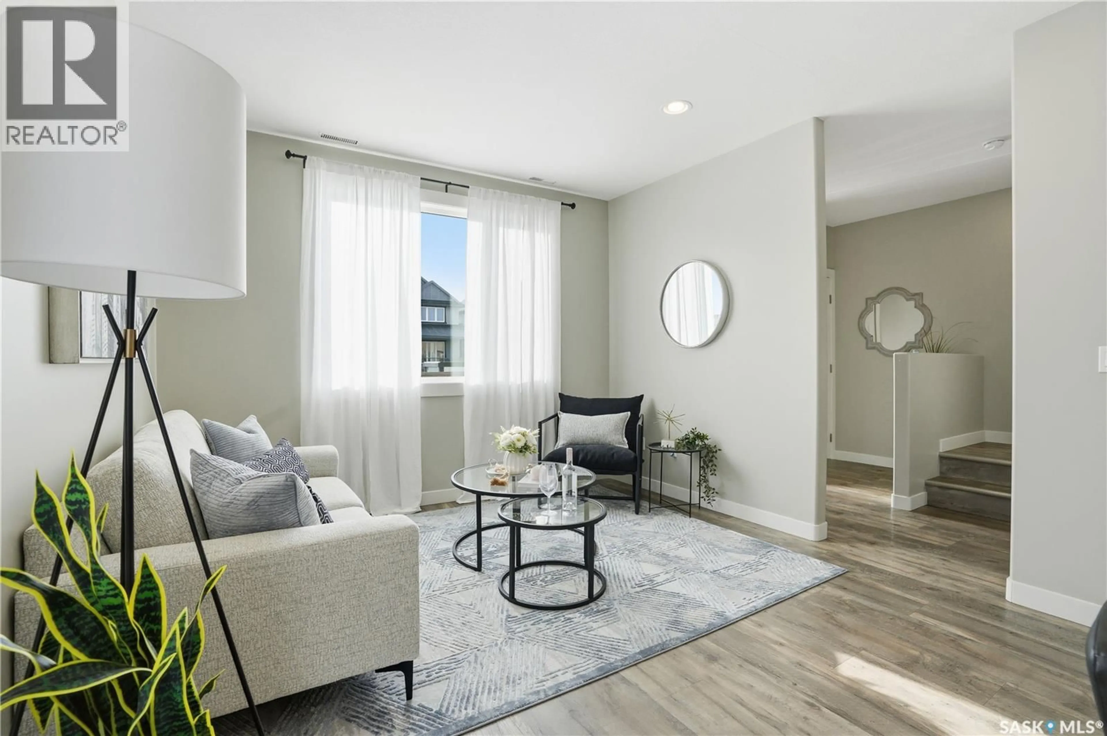 Living room with furniture, unknown for 2 103 WILLIS CRESCENT, Saskatoon Saskatchewan S7T0X9