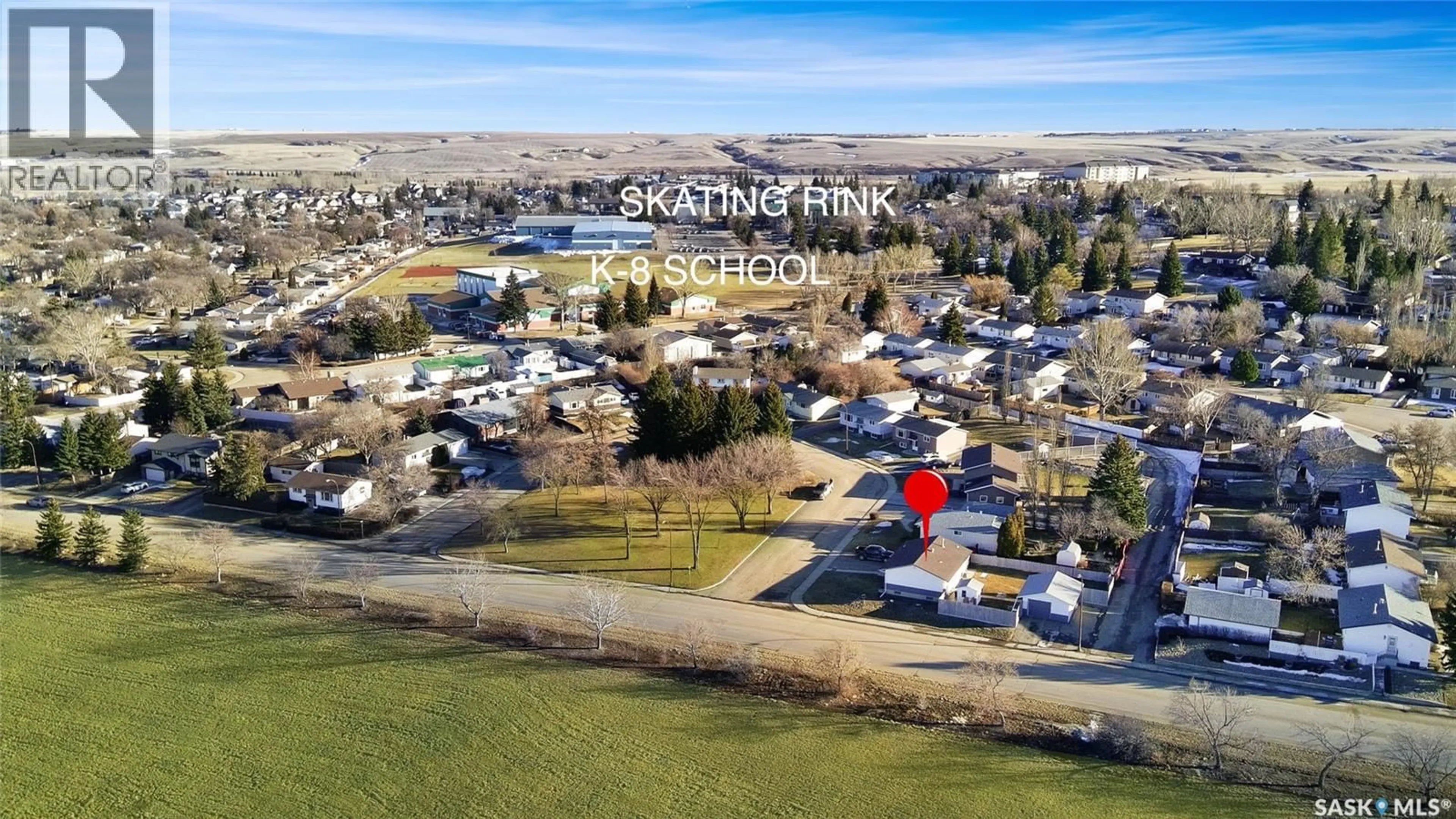 A pic from outside/outdoor area/front of a property/back of a property/a pic from drone, water/lake/river/ocean view for 132 HAW PLACE, Swift Current Saskatchewan S9H4B7