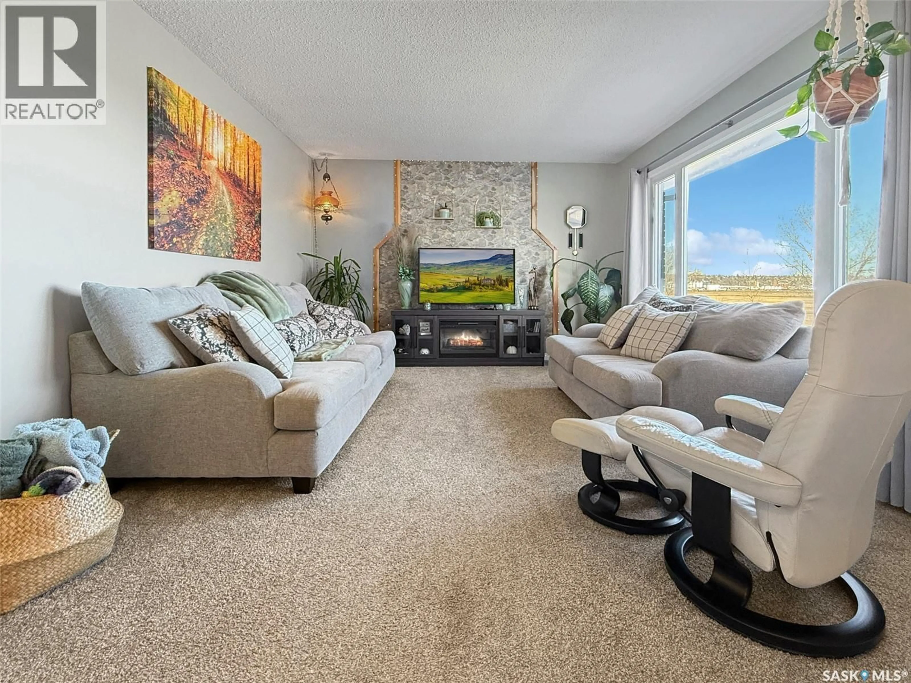 Living room with furniture, unknown for 132 HAW PLACE, Swift Current Saskatchewan S9H4B7