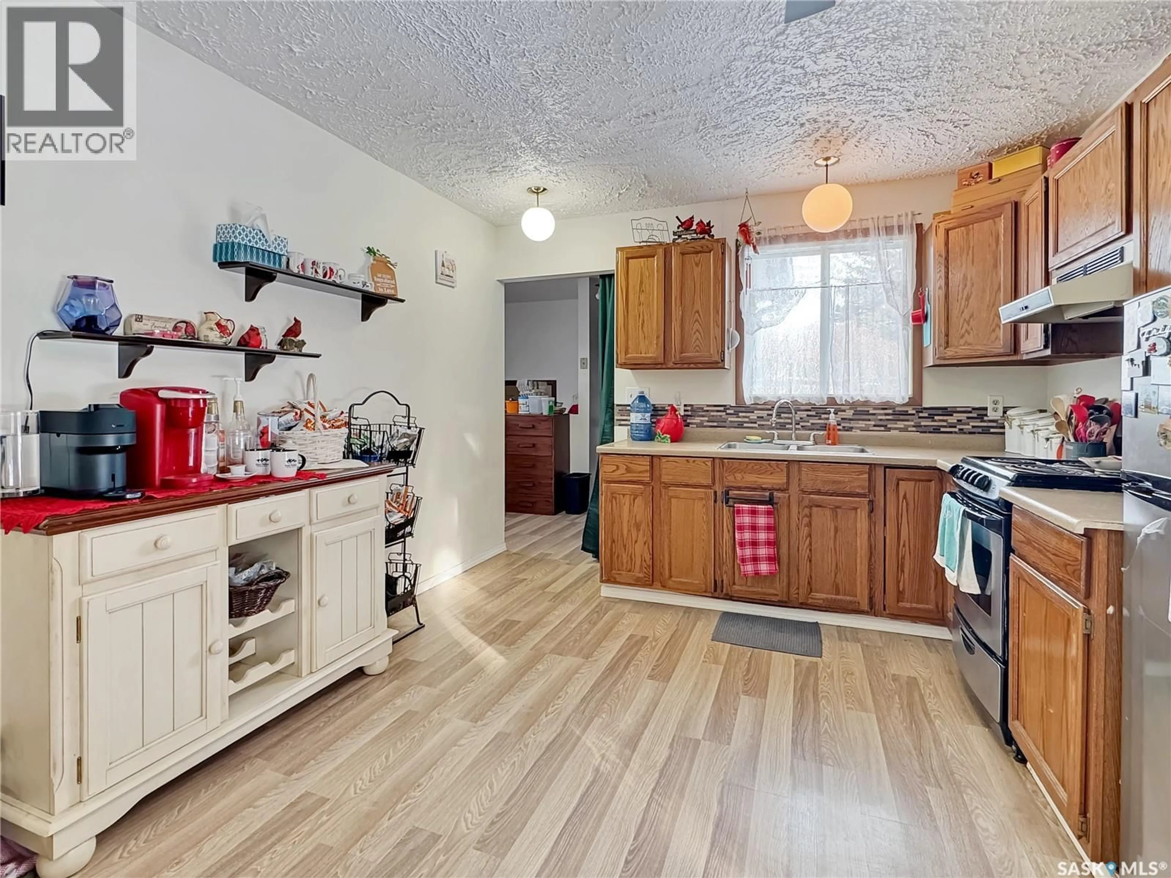 Open concept kitchen, unknown for 301 & 303 OTTER STREET, Cut Knife Saskatchewan S0M0N0